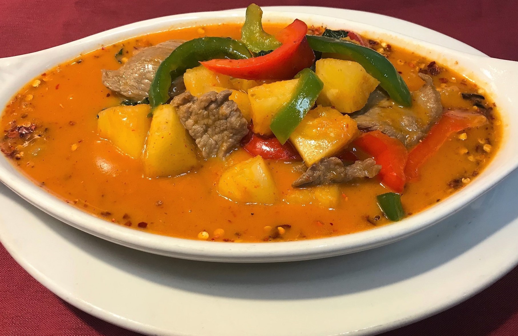 Order Pineapple Curry food online from Sweet Basil Thai Cuisine store, Hurst on bringmethat.com