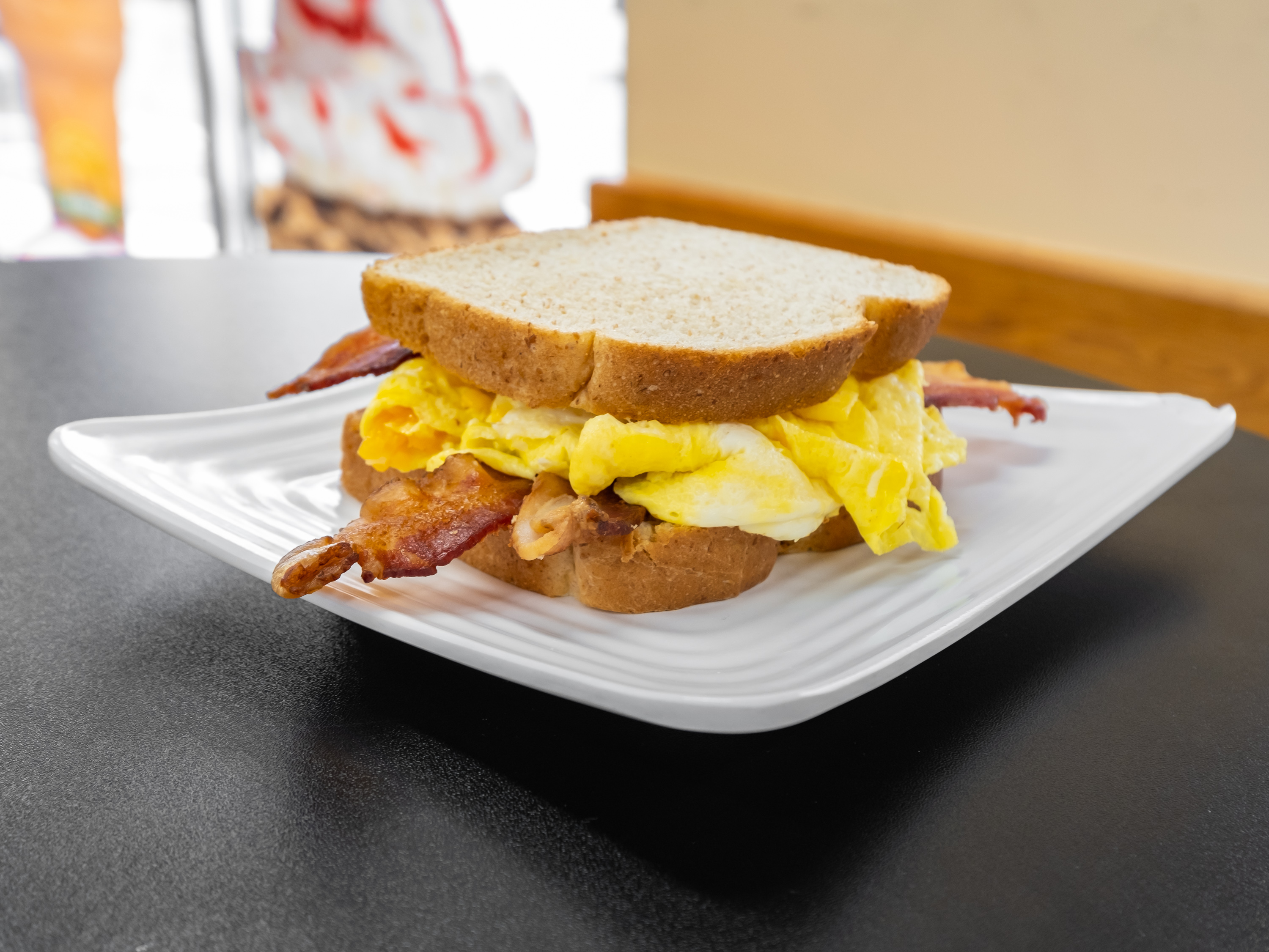Order Turkey, Bacon and Eggs Breakfast Sandwich food online from Lily Kitchen store, Oxon Hill on bringmethat.com
