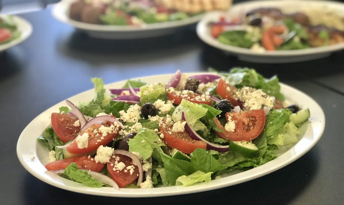 Order Greek Salad food online from Gussy's Place store, Durham on bringmethat.com