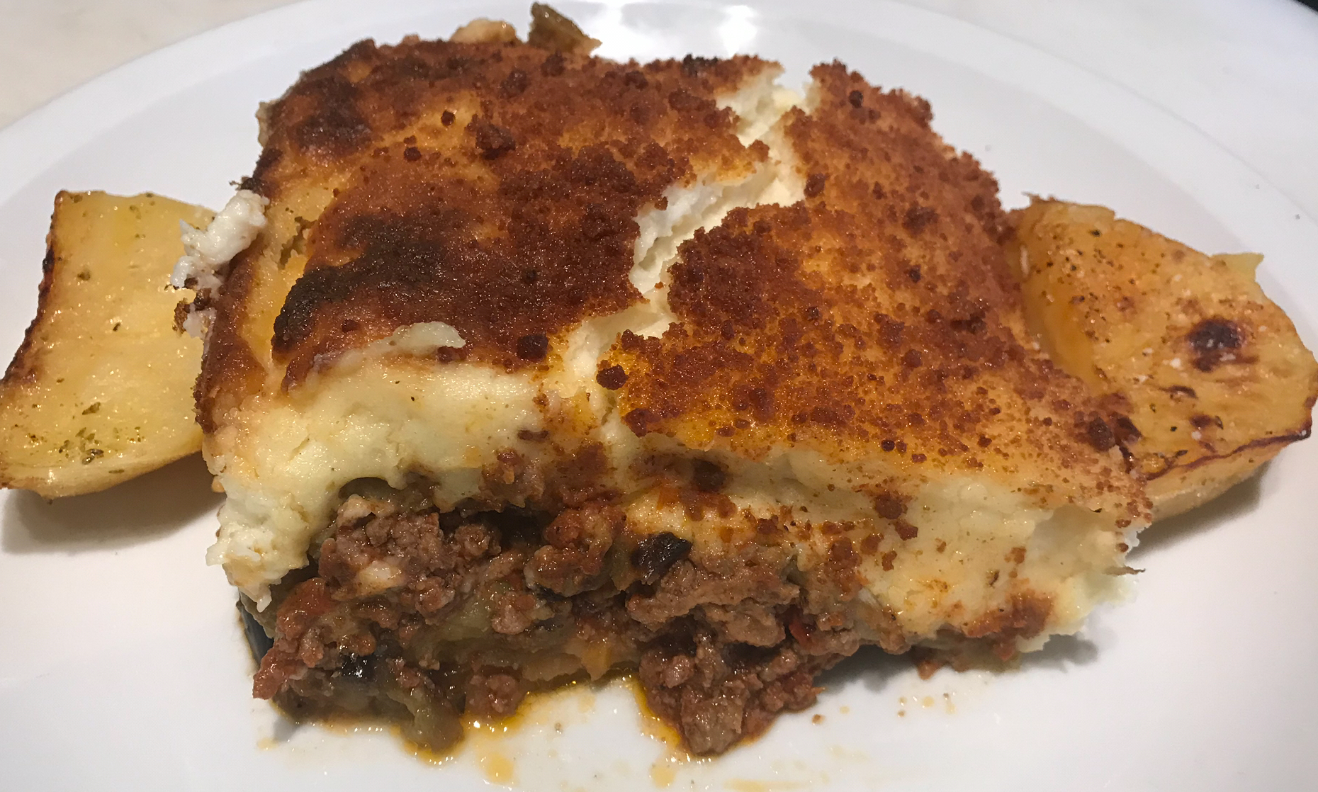 Order Mousaka food online from Mythos Authentic Hellenic Cuisine store, Flushing on bringmethat.com