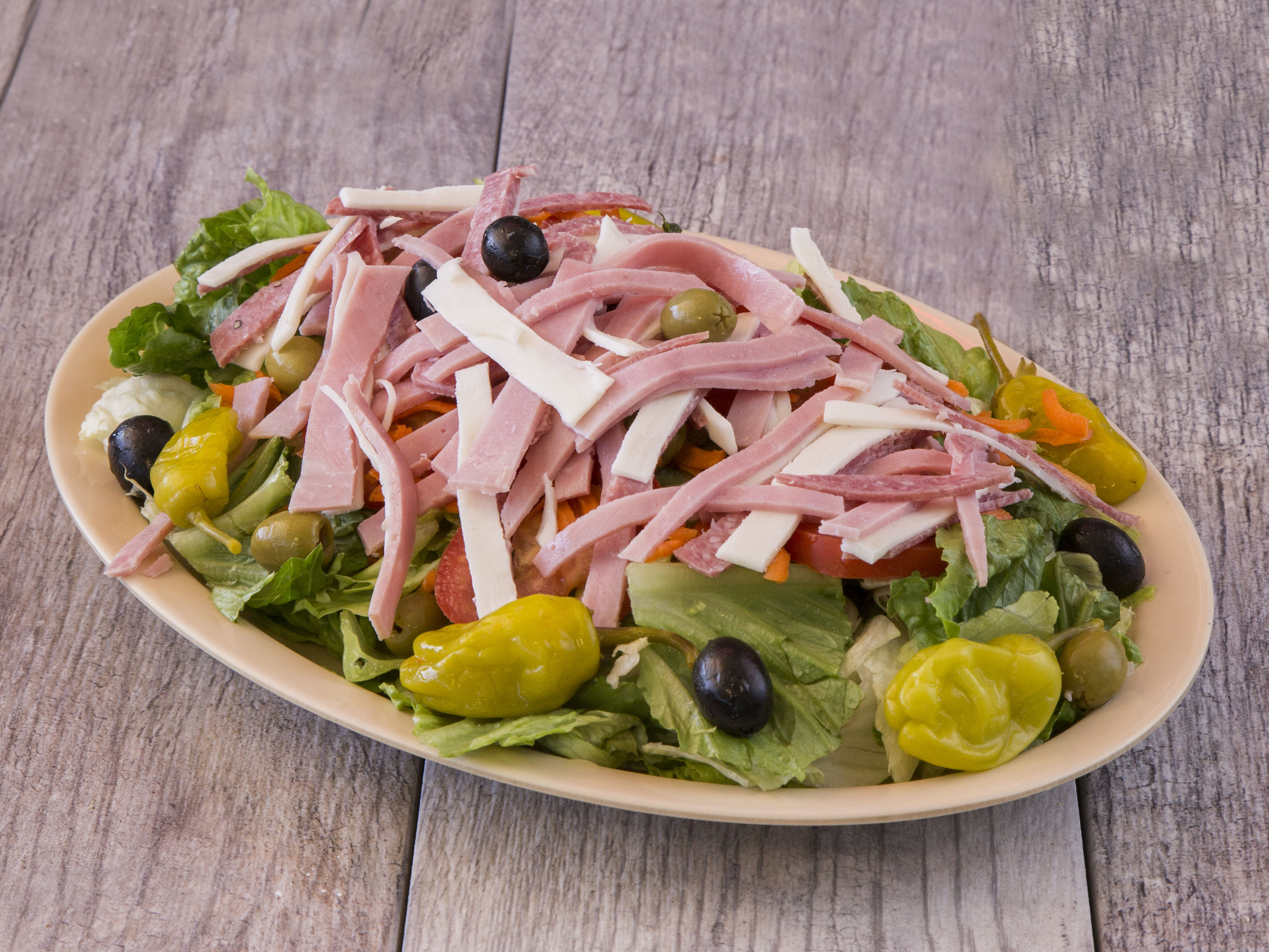 Order Antipasto Salad food online from Famous Ray's Pizza store, Glendale on bringmethat.com