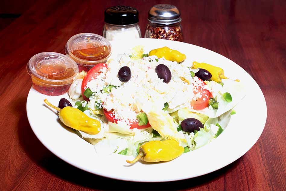Order Greek Antipasto Salad food online from Tony's Pizzeria store, New Hartford on bringmethat.com
