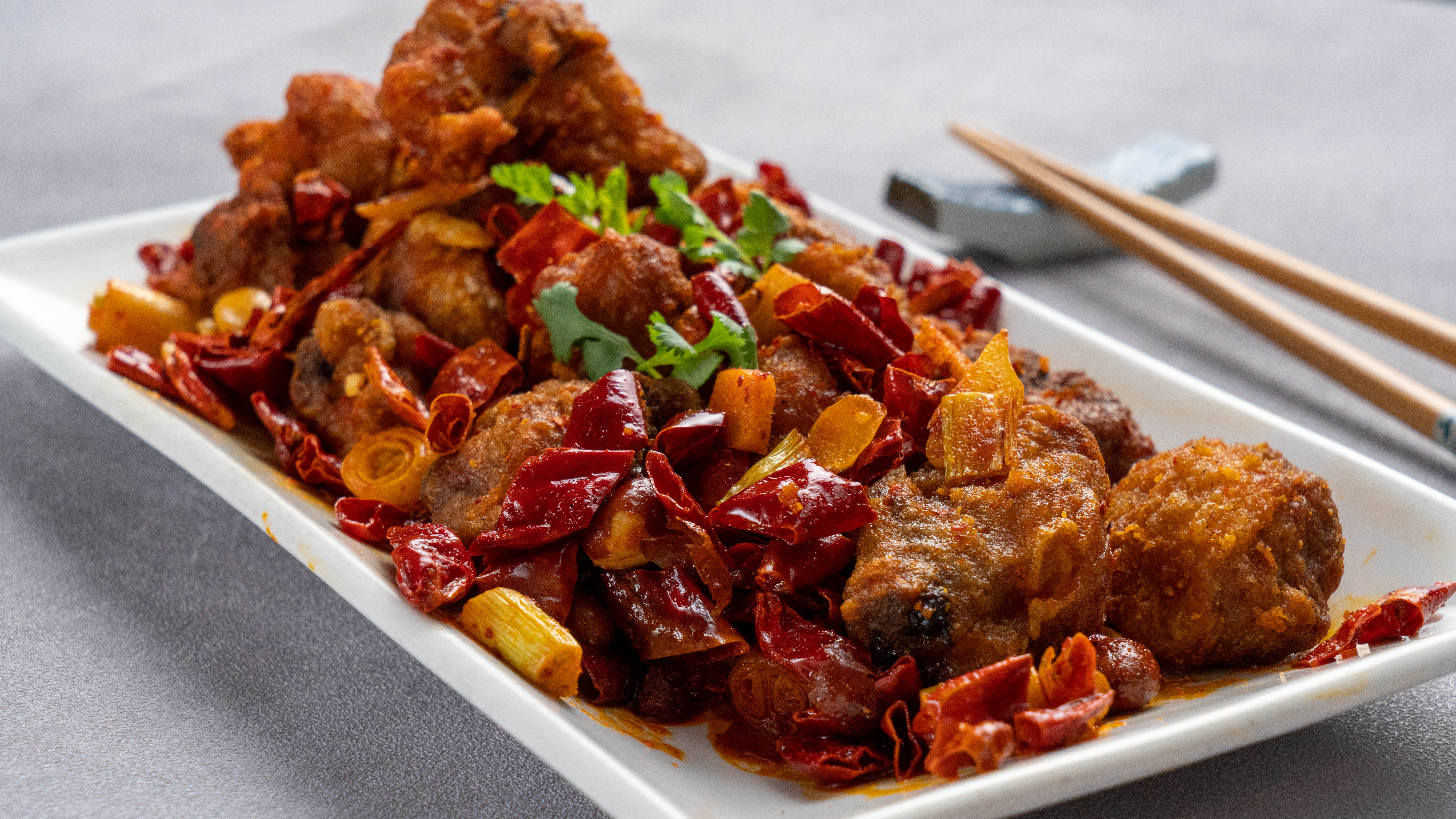 Order A23. Szechwan Spicy Chicken food online from Milk and Honey Cafe store, Fremont on bringmethat.com