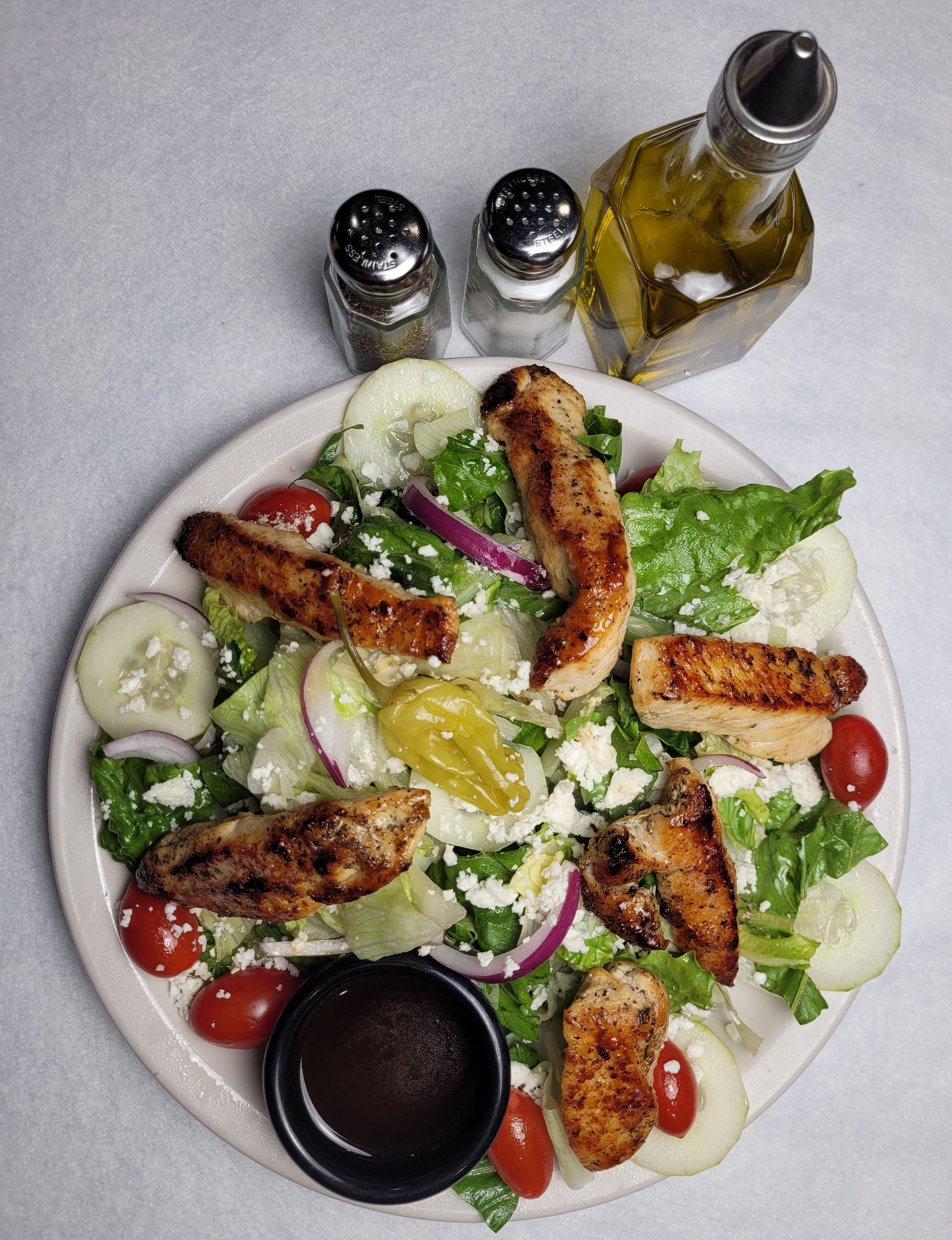 Order Grilled Chicken Salad - Medium food online from Mony Pizzeria store, Houston on bringmethat.com