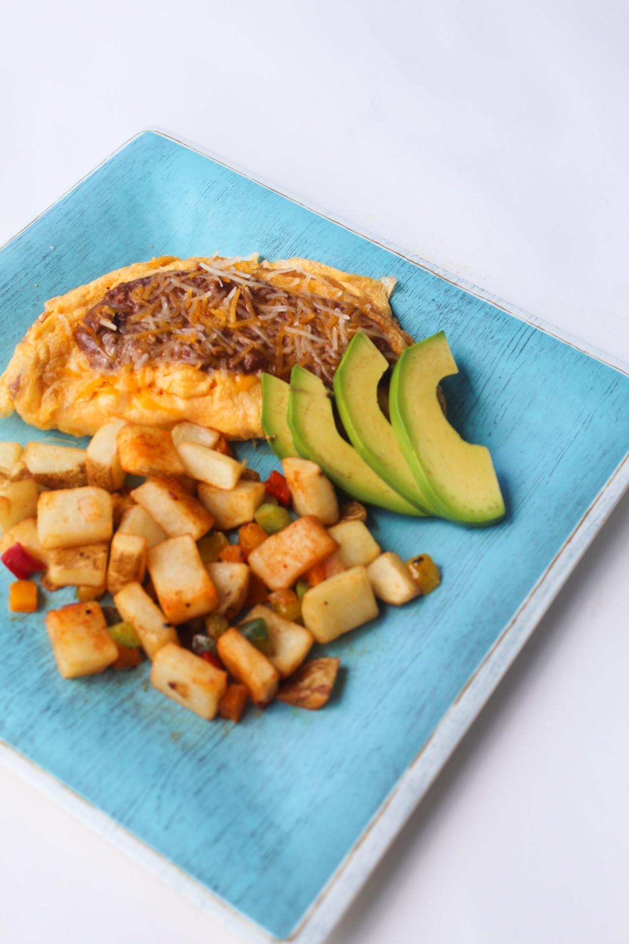 Order CHILI OMELET food online from Wisk Am Eatery store, Prosper on bringmethat.com