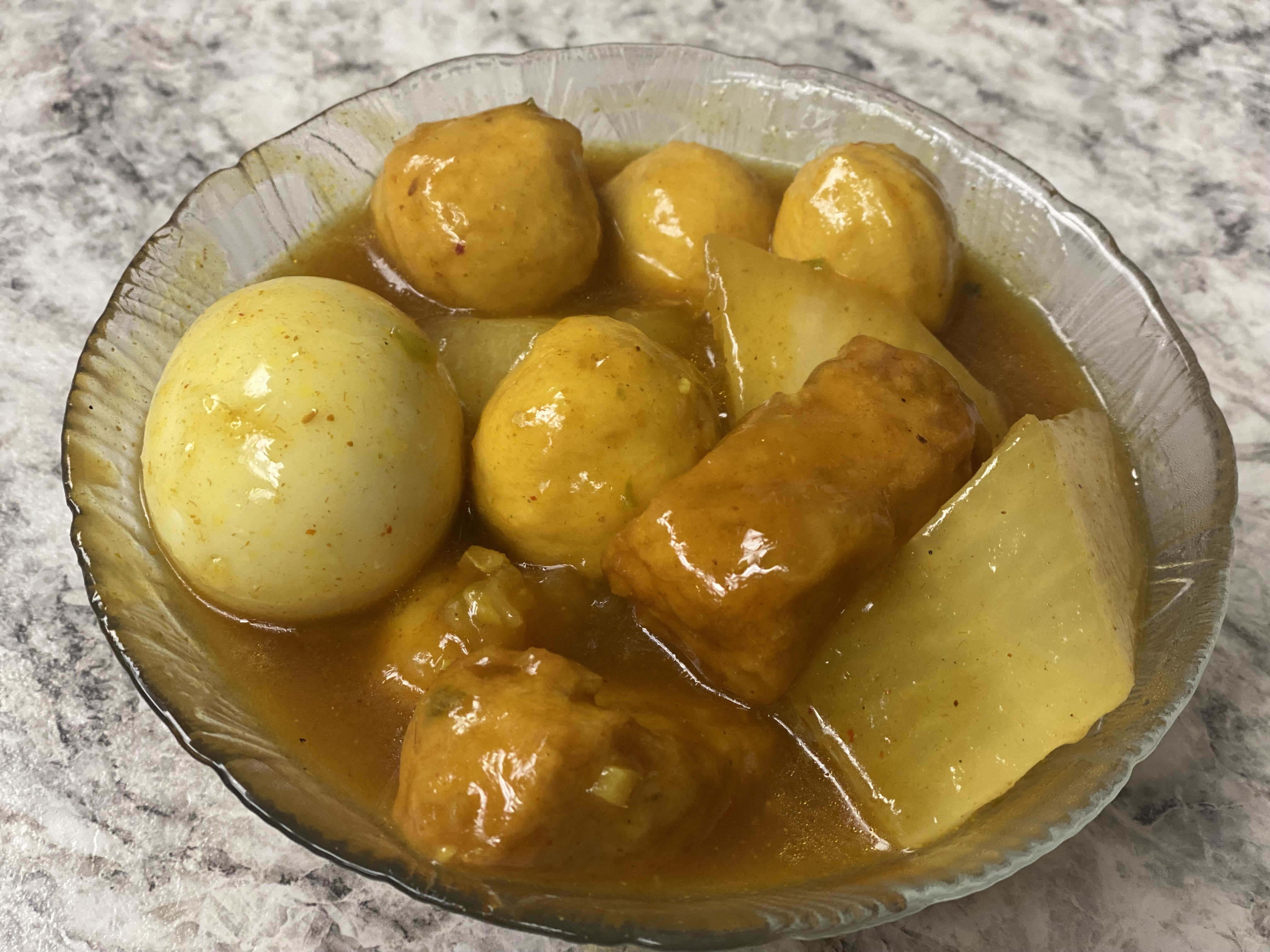Order SN05. Fish Balls & Daikon in Curry Sauce 咖哩蘿蔔魚豆腐 food online from Uncle Chen Primetime store, State College on bringmethat.com