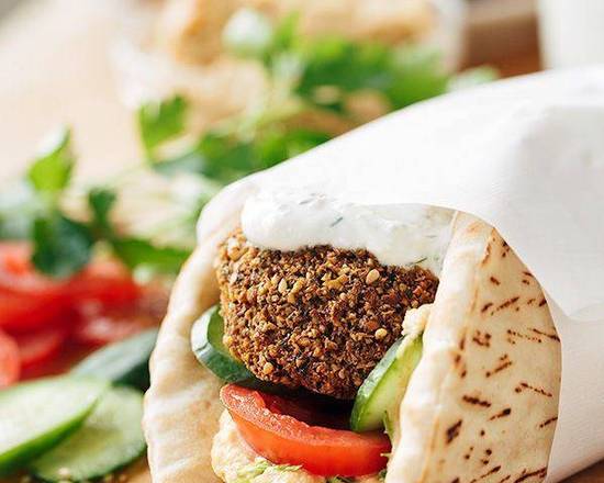 Order Greek Falafel Wrap food online from East and Feast Lounge store, Austin on bringmethat.com