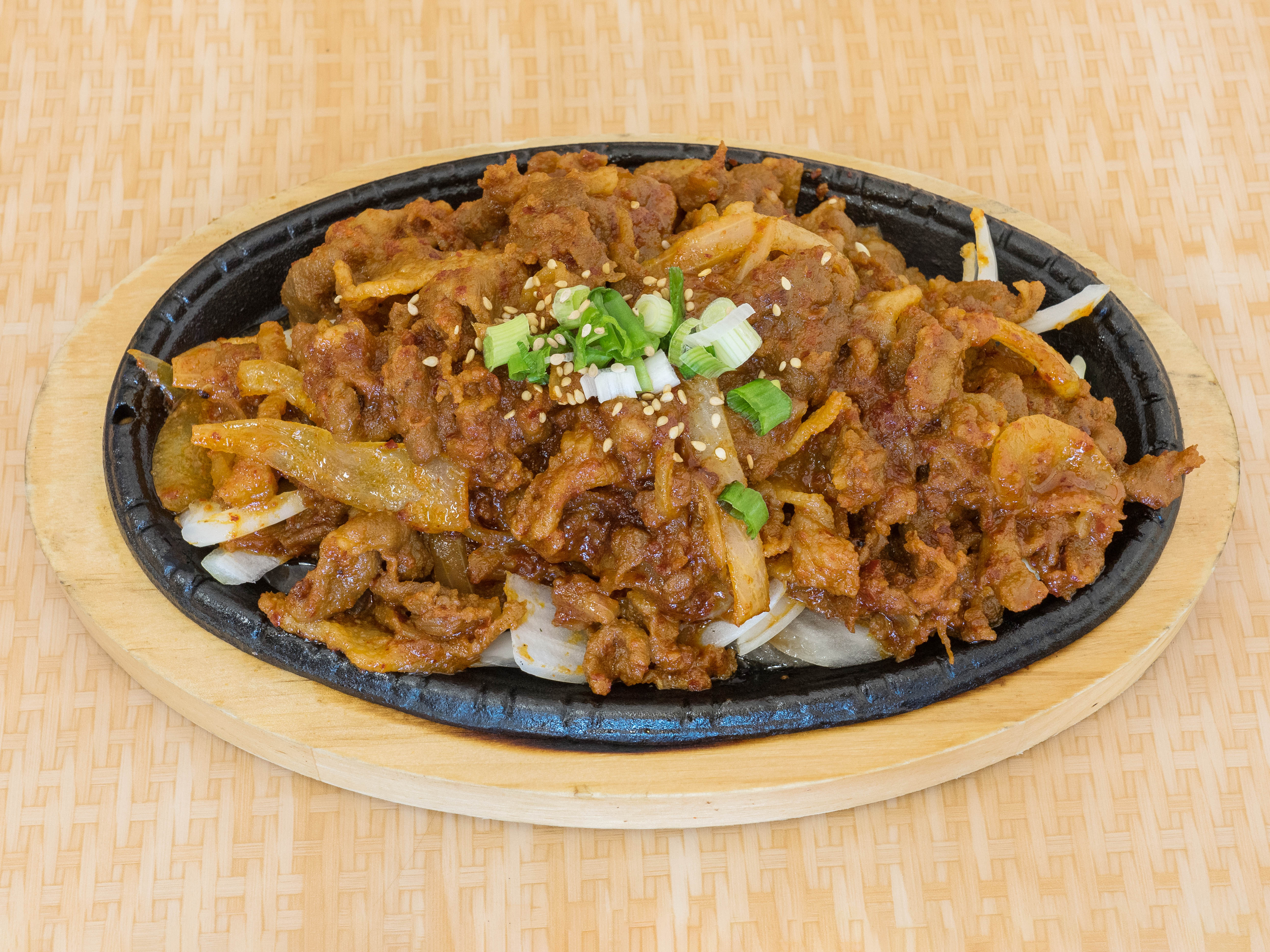 Order 18. Spicy Pork Bulgogi food online from Sisters Korean Kitchen store, Cerritos on bringmethat.com