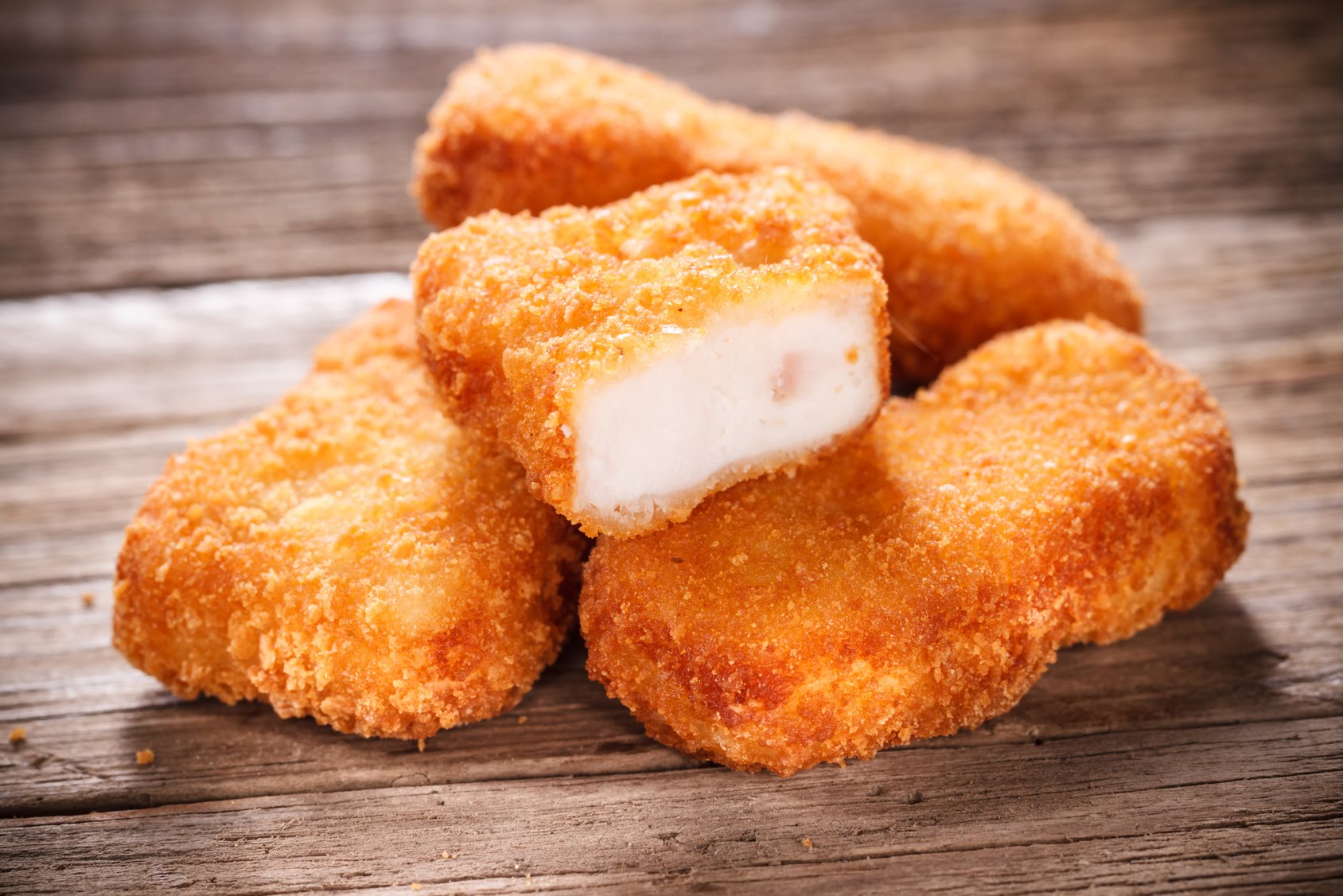 Order 12 Piece Chicken Nuggets food online from Pizza Belly store, Katy on bringmethat.com