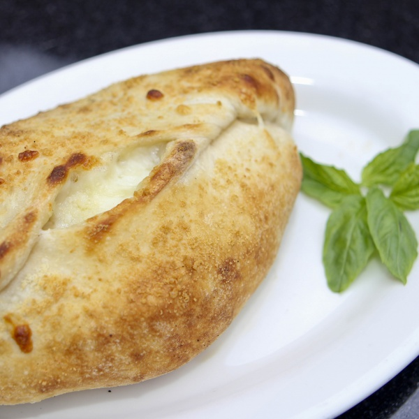 Order Calzone Classic food online from Ciro's Pizza Cafe store, Folsom on bringmethat.com