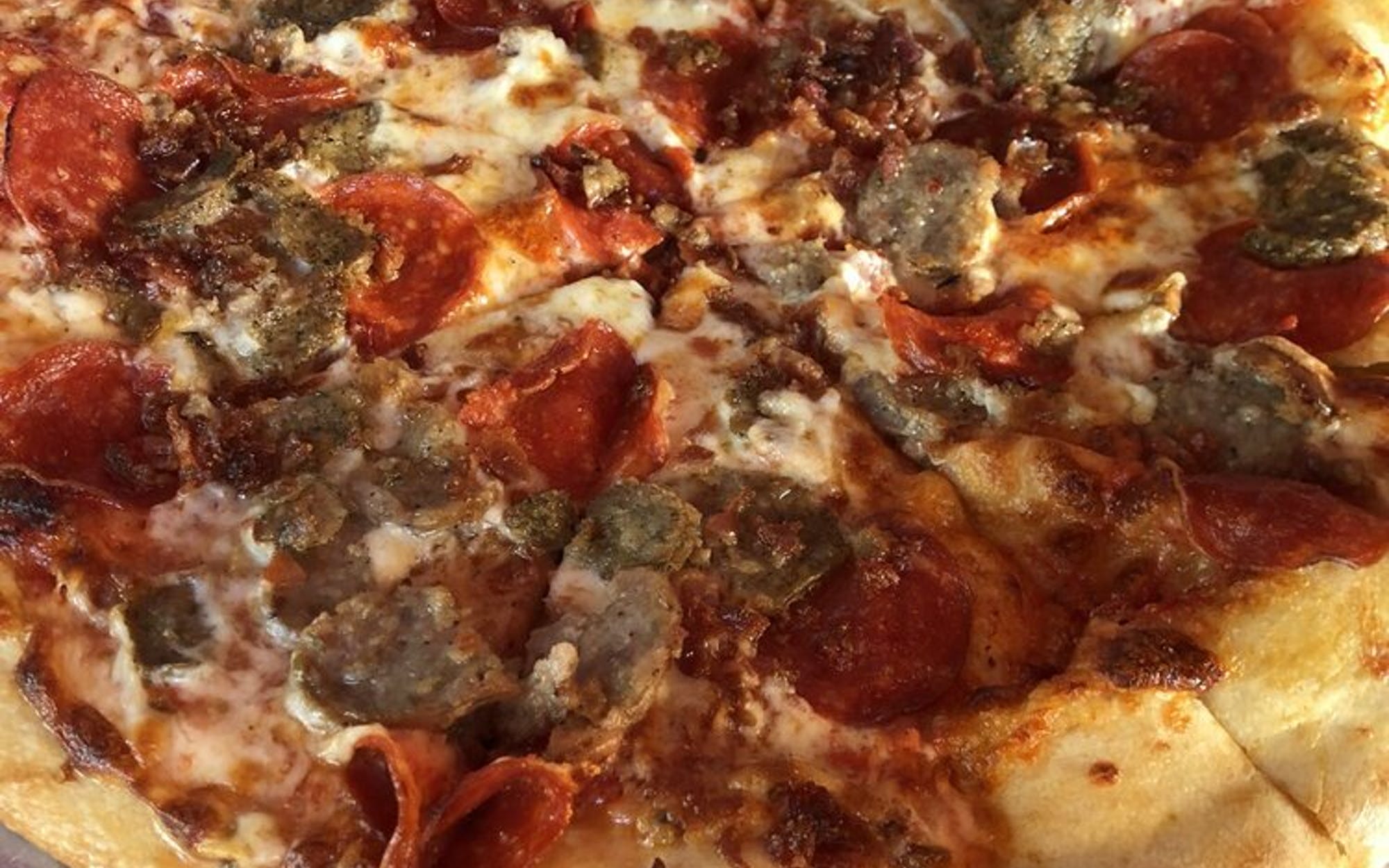 Order Meat Eater's Pizza food online from Albie's Pizza store, Virginia Beach on bringmethat.com