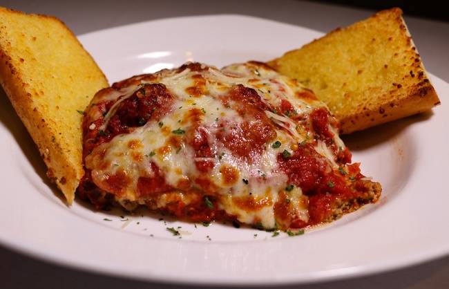 Order Homemade Meat Lasagna food online from Papa Luigi's Pizza store, Cudahy on bringmethat.com