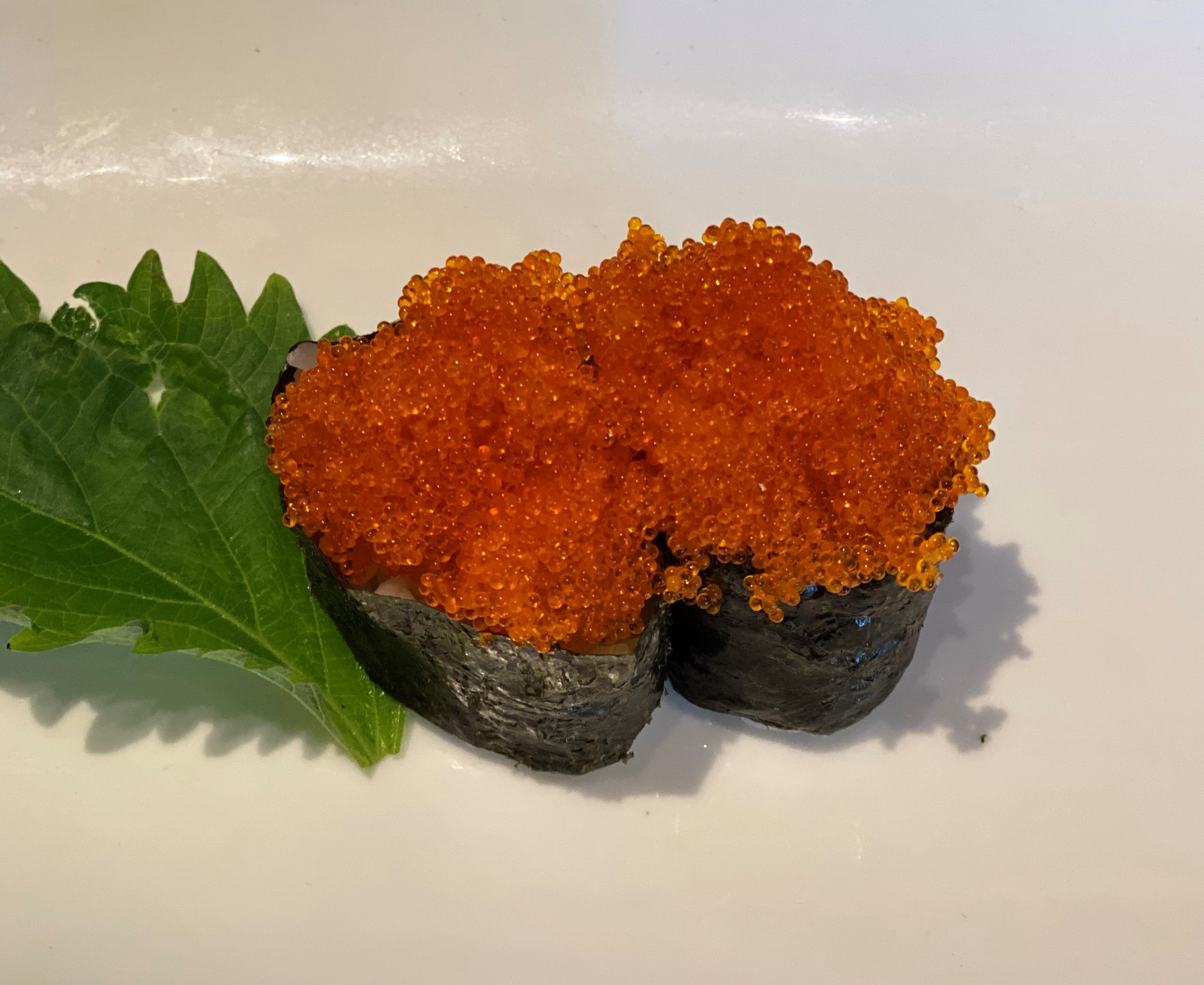 Order Flying Fish Roe Nigiri food online from Sushi Confidential store, Campbell on bringmethat.com