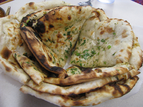 Order Garlic Naan food online from Halal Kitch store, Egg Harbor Township on bringmethat.com