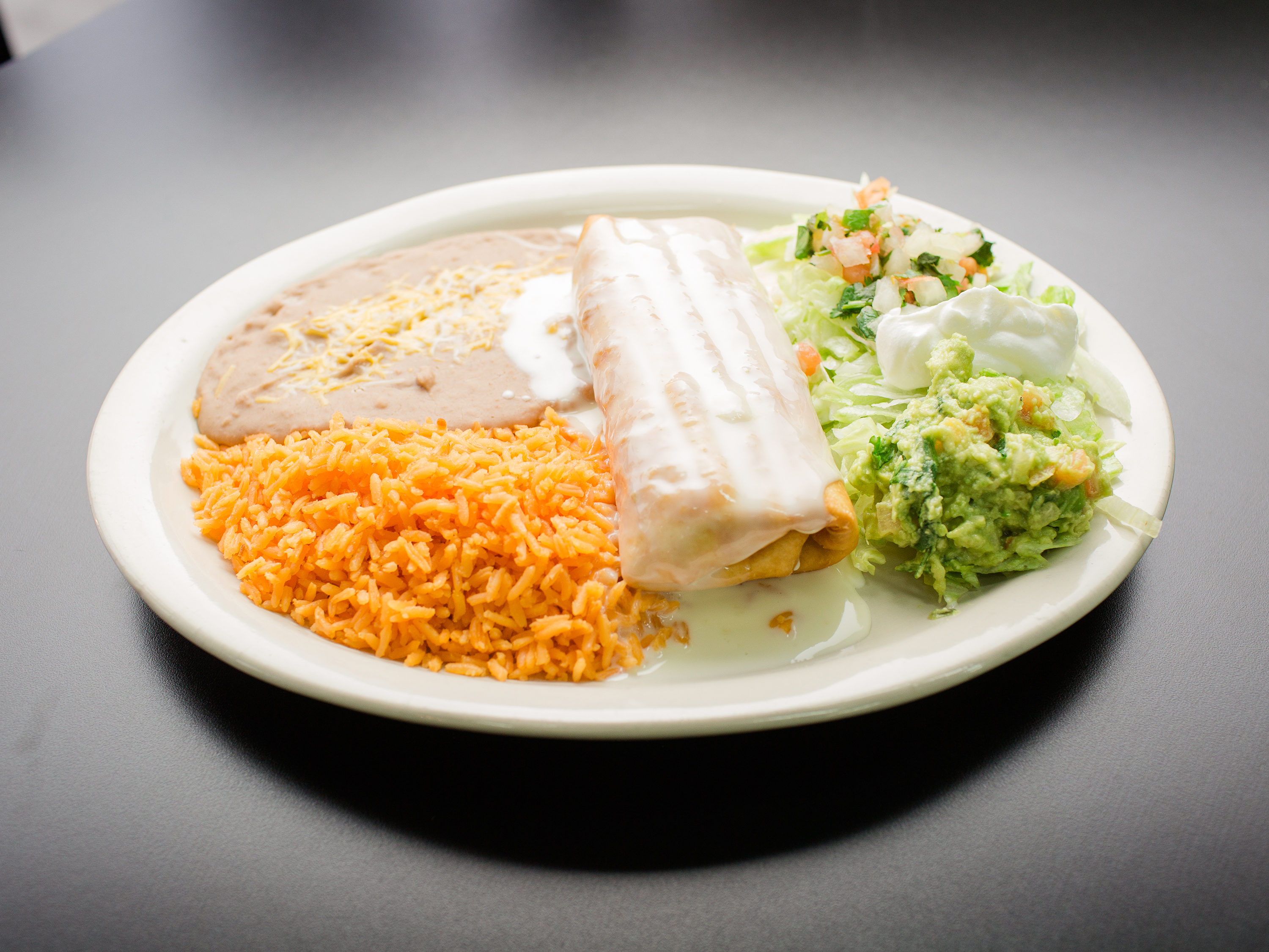 Order Chimichanga food online from Pollo Loco store, Sevierville on bringmethat.com