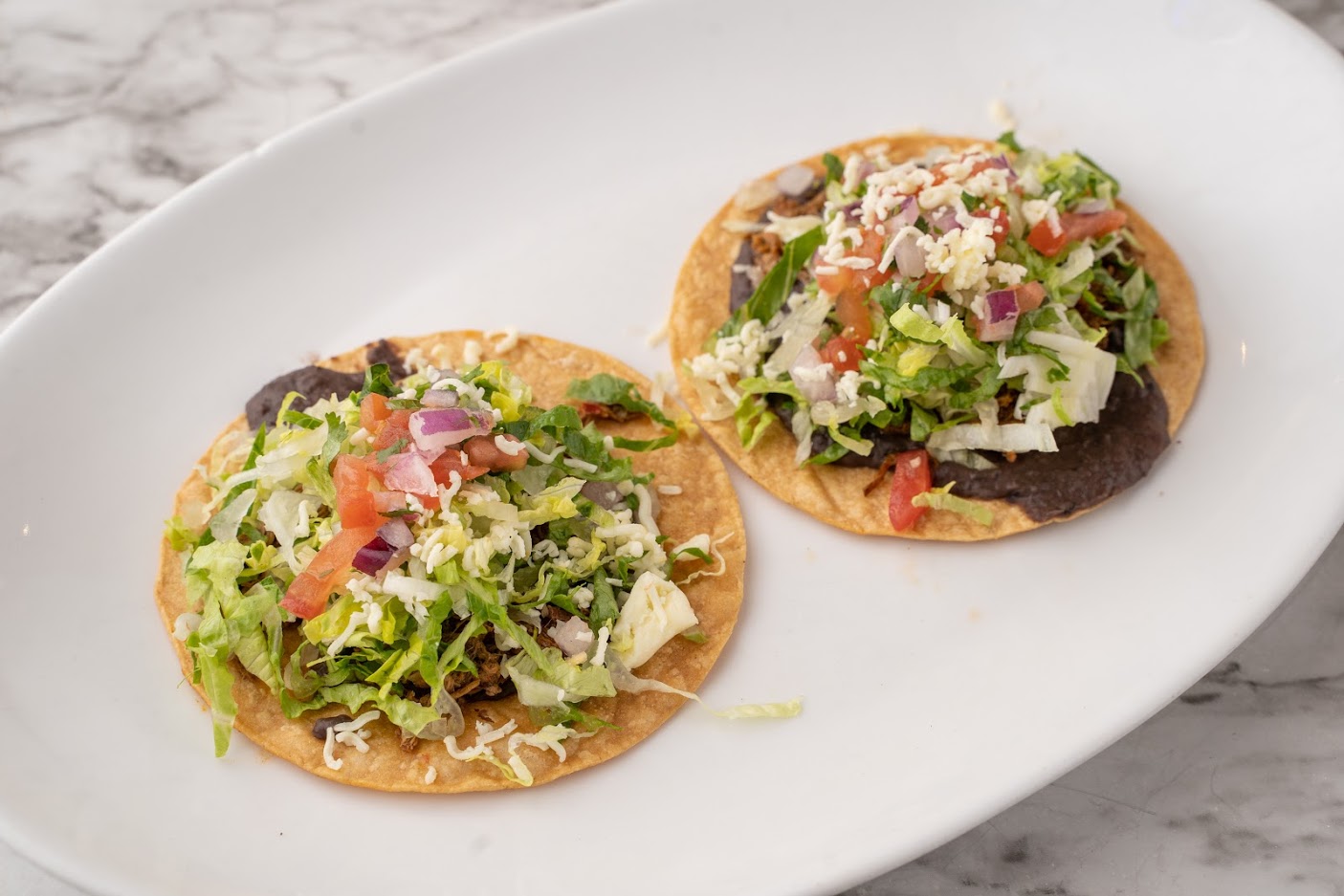 Order Crab Tostadas food online from Zocalo Street Food | Tequila store, Wilmington on bringmethat.com