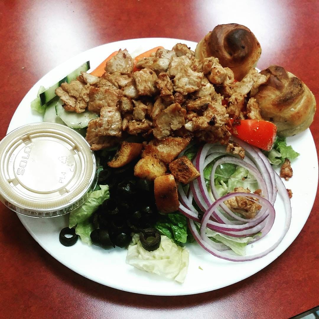 Order Tossed Grilled Chicken Salad - Small food online from Tony Sopranos Pizza store, Cherry Hill on bringmethat.com