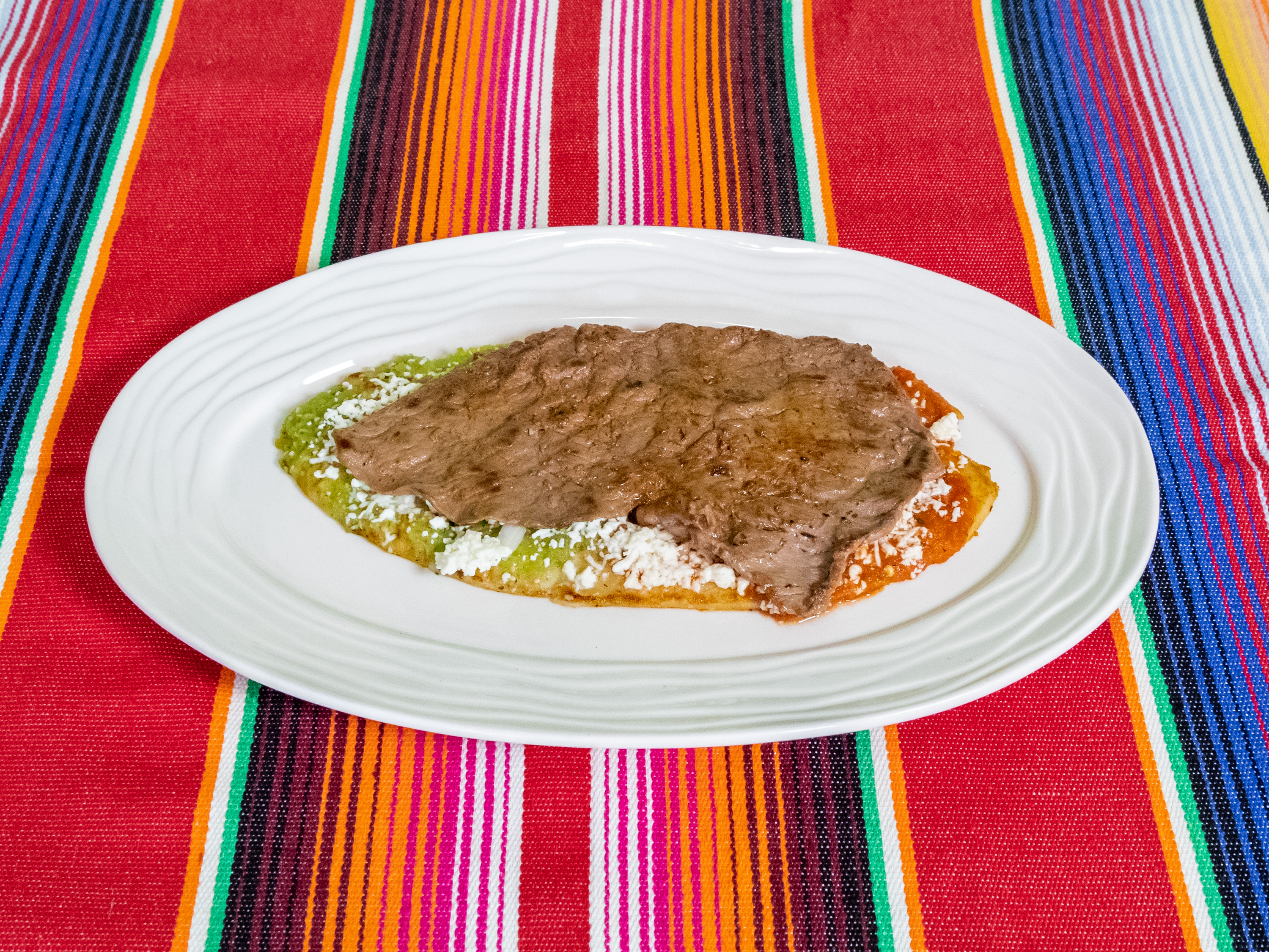 Order Huaraches food online from El Nopalito store, Phoenix on bringmethat.com