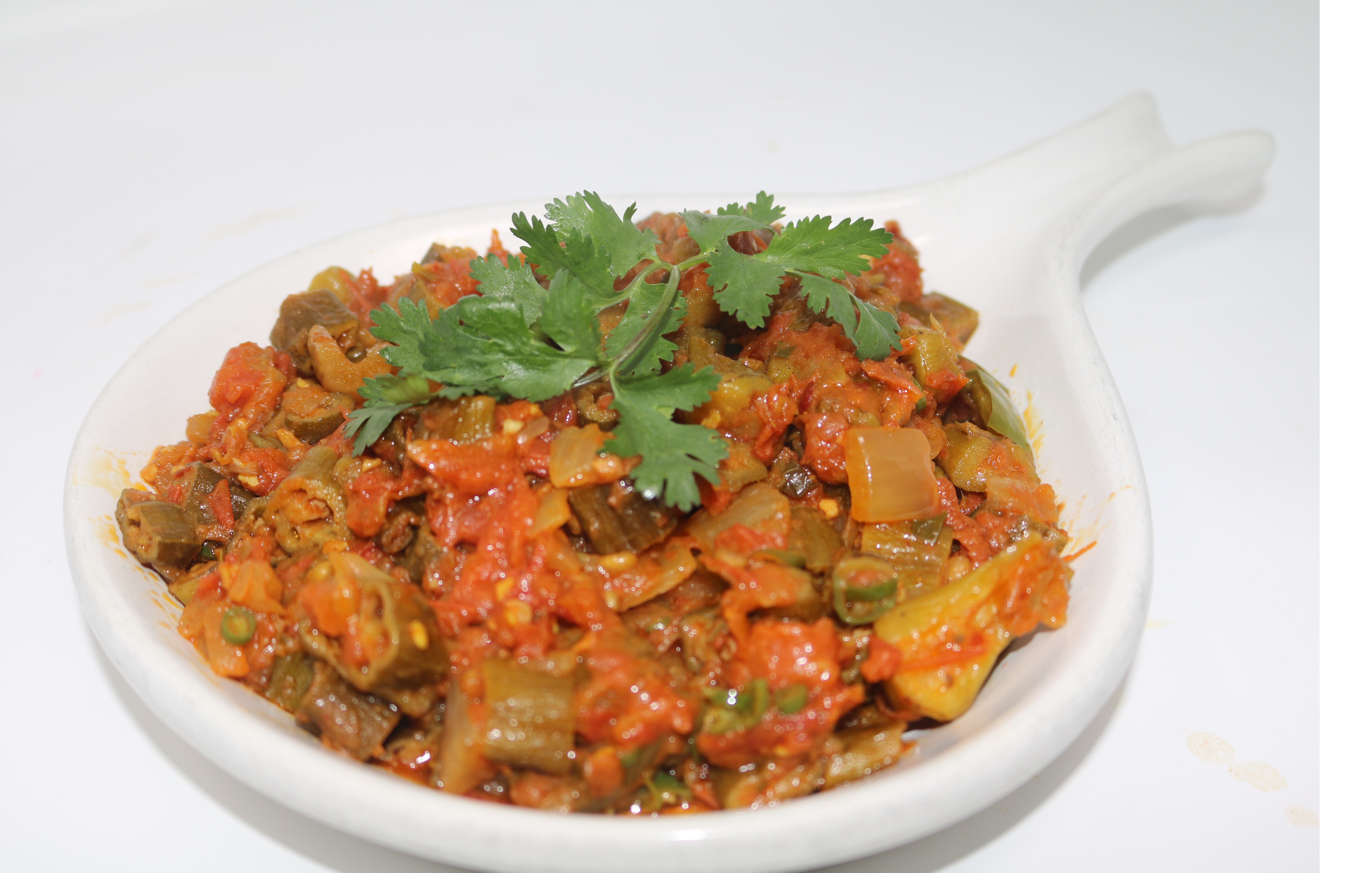 Order Bhindi Masala food online from Anmol Restaurant store, Milwaukee on bringmethat.com