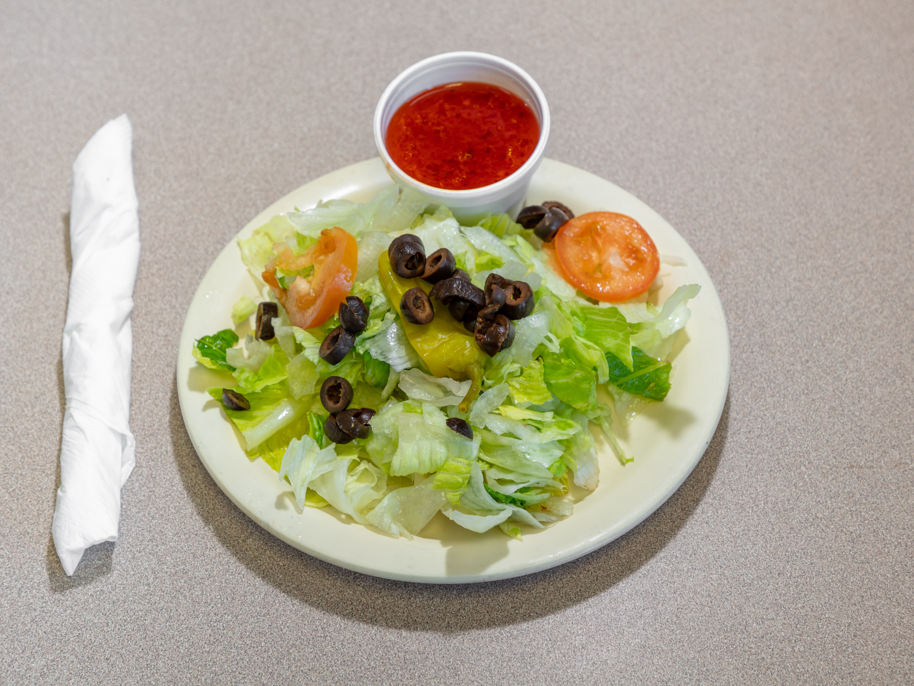 Order Tossed Salad food online from Goodfellas Pizza & Subs store, Wylie on bringmethat.com