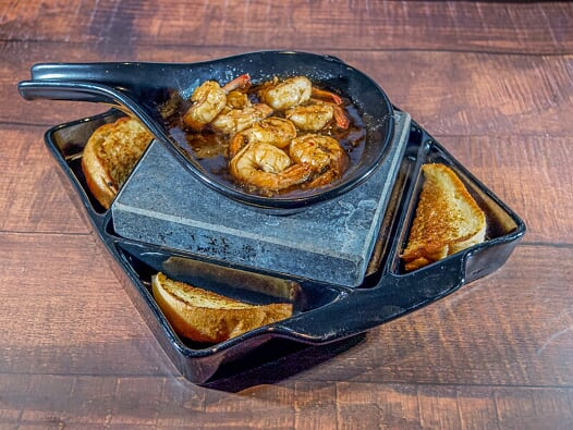 Order Bubbling Shrimp on a Stone food online from Black Rock Bar & Grill store, Toledo on bringmethat.com