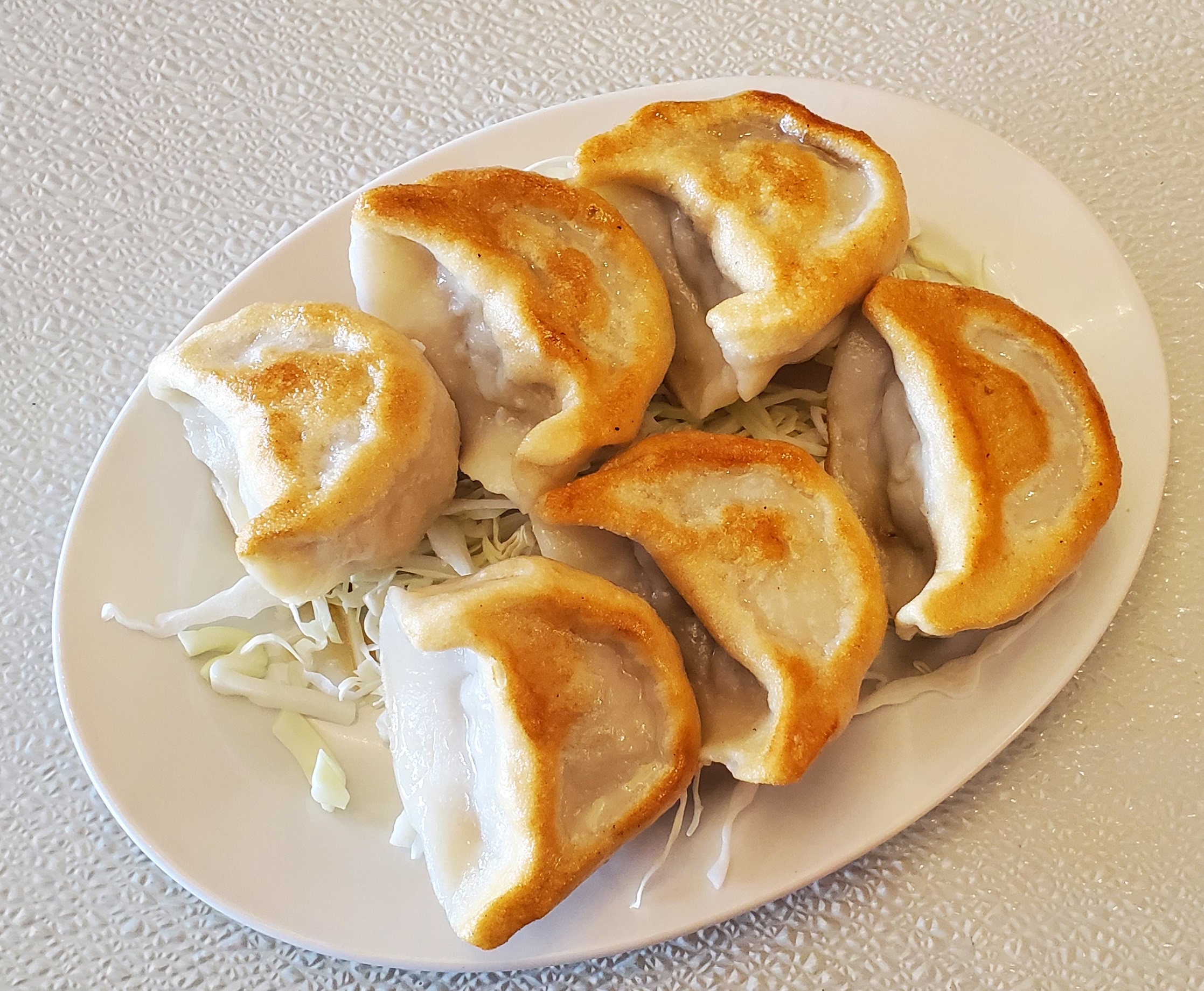 Order A02. Homemade Pot Stickers food online from Szechuan House store, Aloha on bringmethat.com