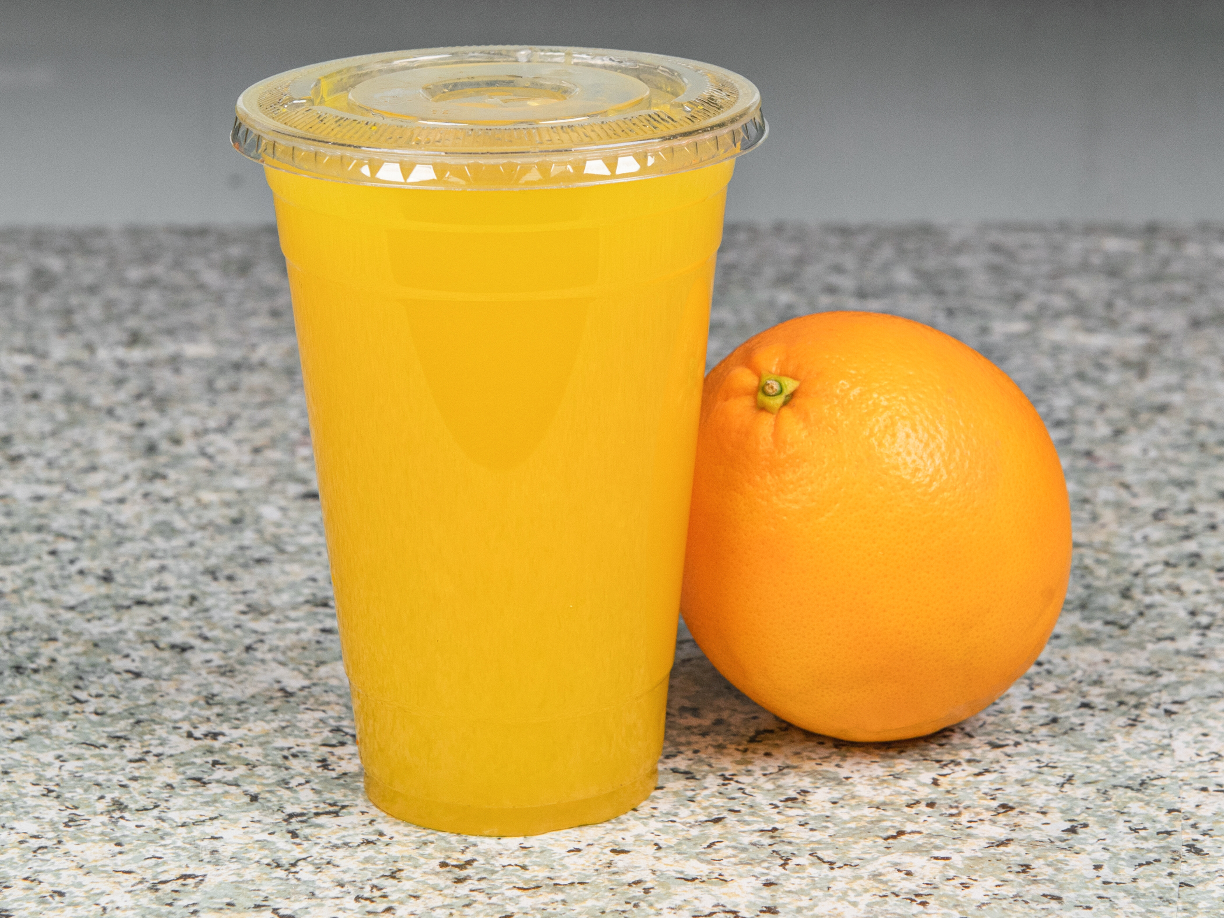 Order 85. Fresh Squeezed Orange Juice food online from Hemo's Spot store, The Bronx on bringmethat.com