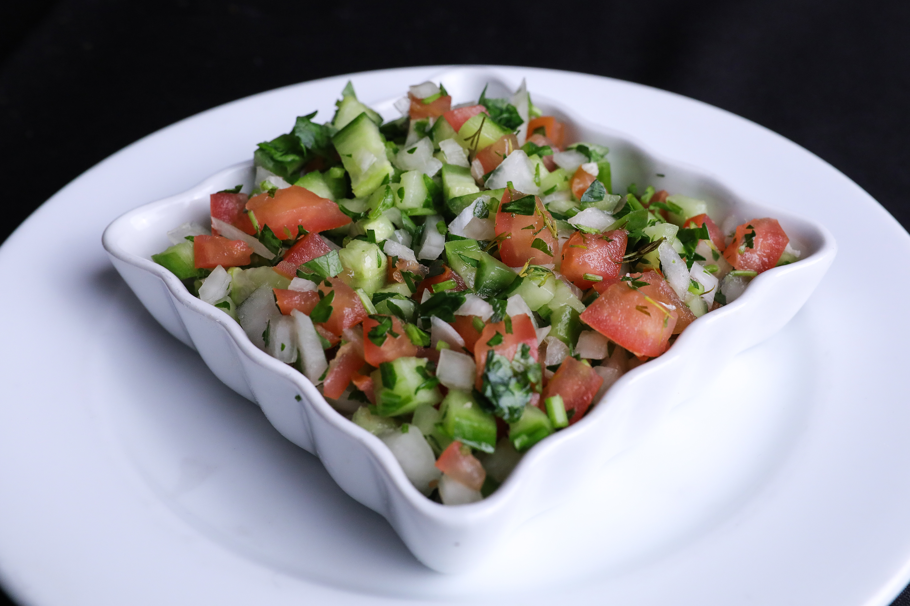 Order Shirazi Salad food online from Port Restaurant & Bar store, Corona Del Mar on bringmethat.com