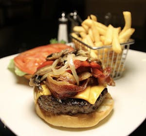 Order American Style Kobe Beef Burger food online from Marco Polo's store, Westbury on bringmethat.com