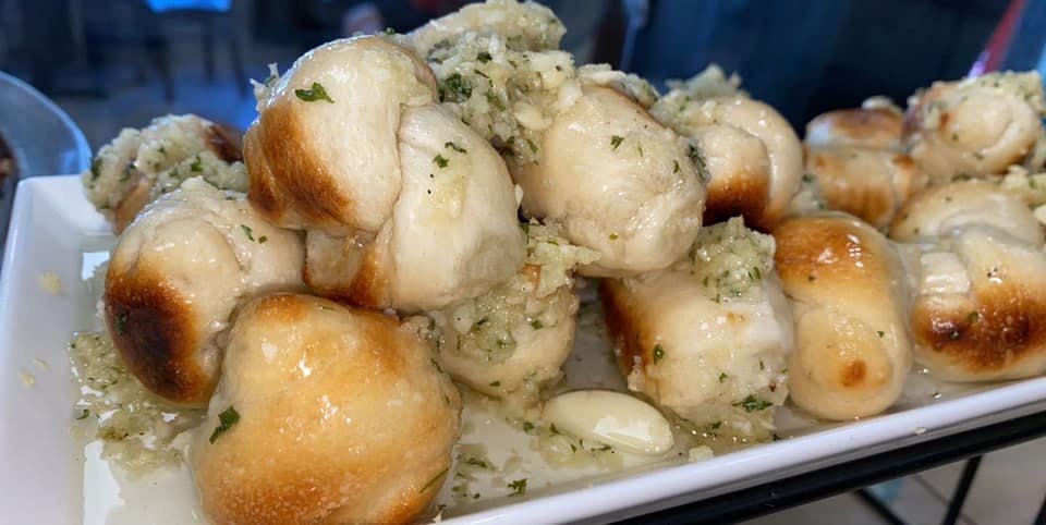 Order Garlic Knots - 8 Pieces food online from Lorenzo's Pizza store, Staten Island on bringmethat.com