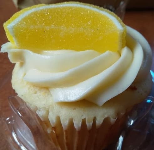 Order Zesty Citron  Lemon Cupcake food online from Suga Cakery store, Pflugerville on bringmethat.com