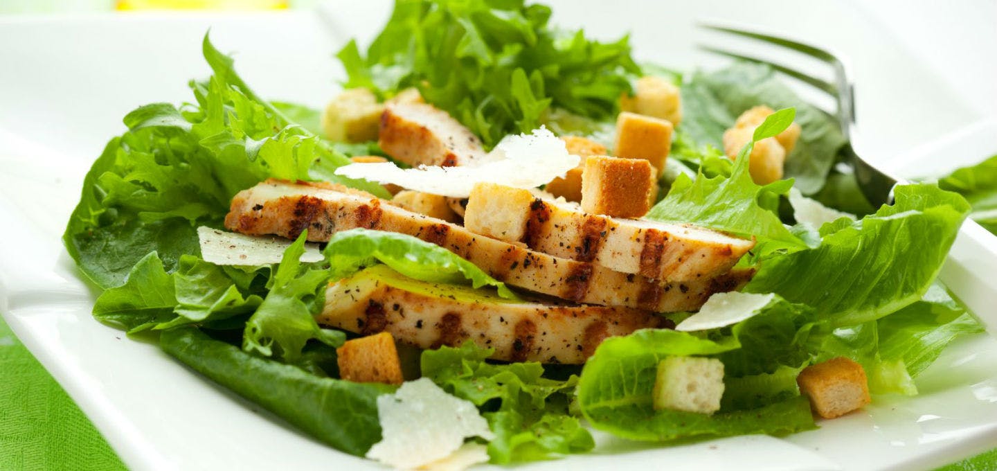 Order Chicken Caesar Salad - Salad food online from Poppy's Pizzeria store, Langhorne on bringmethat.com