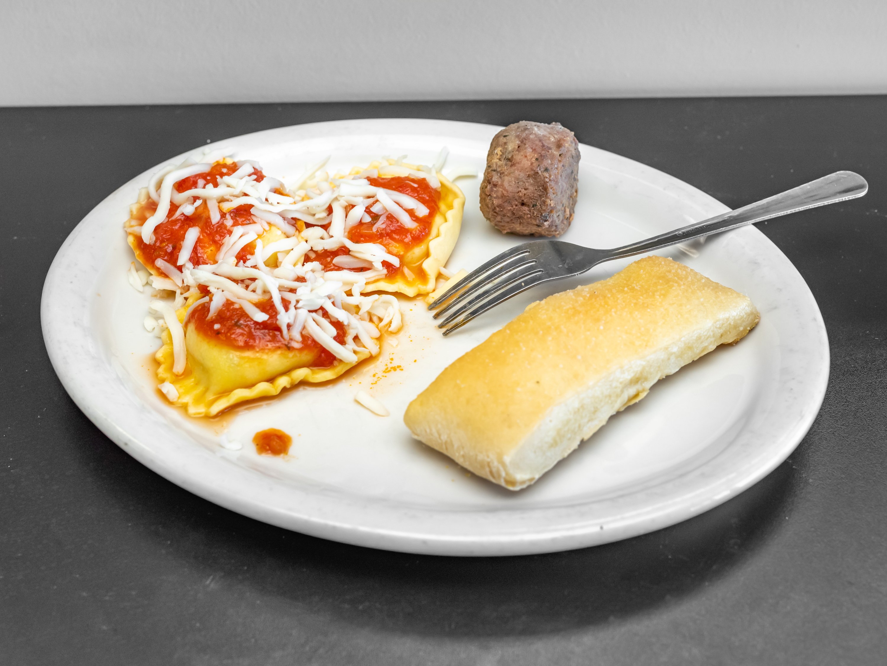 Order Cheese Ravioli Lunch food online from Tonti's Pizzeria store, Parker on bringmethat.com