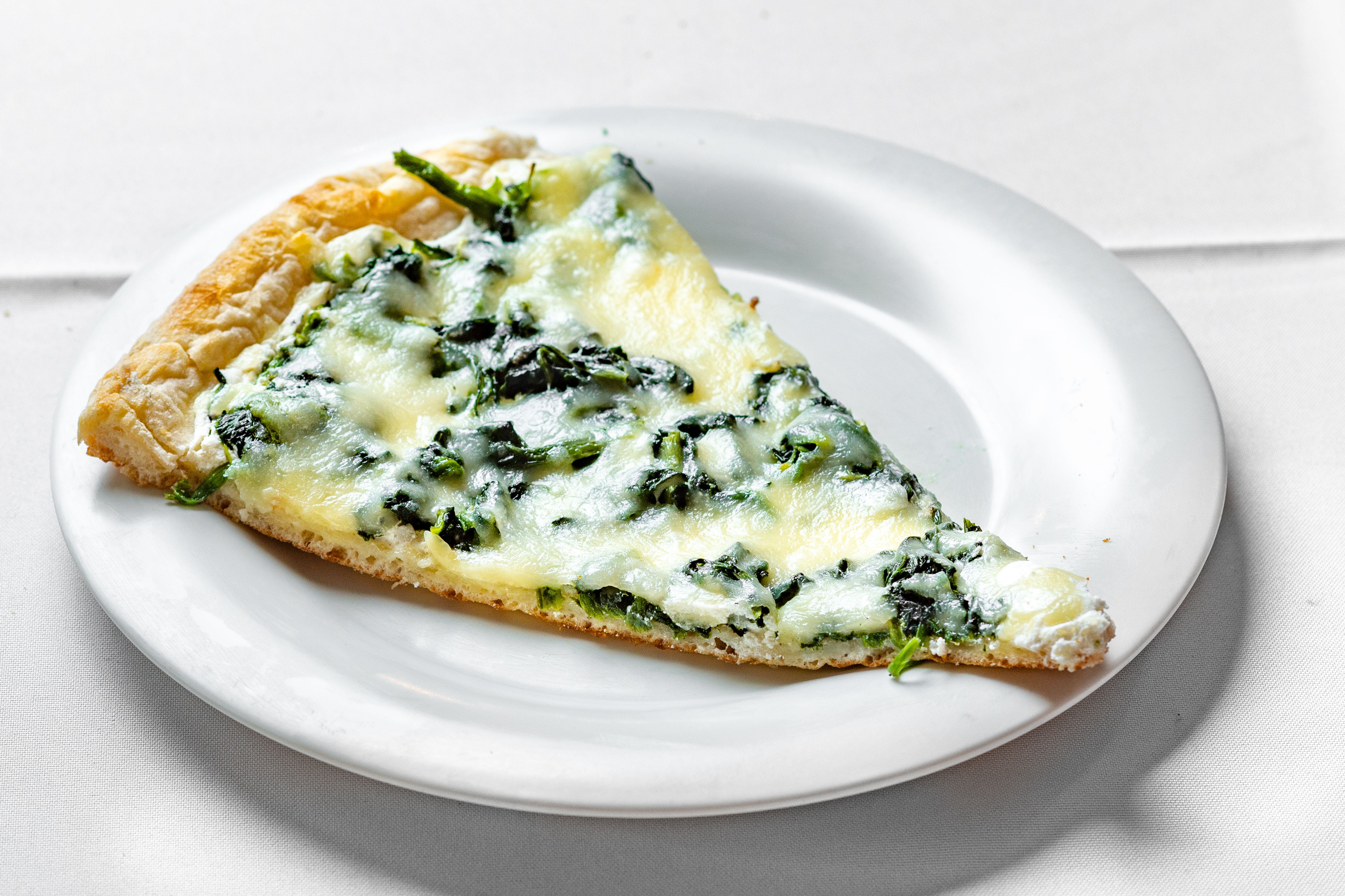 Order White Spinach Pizza - Personal 12" food online from Frank's Pizza store, Hopatcong on bringmethat.com