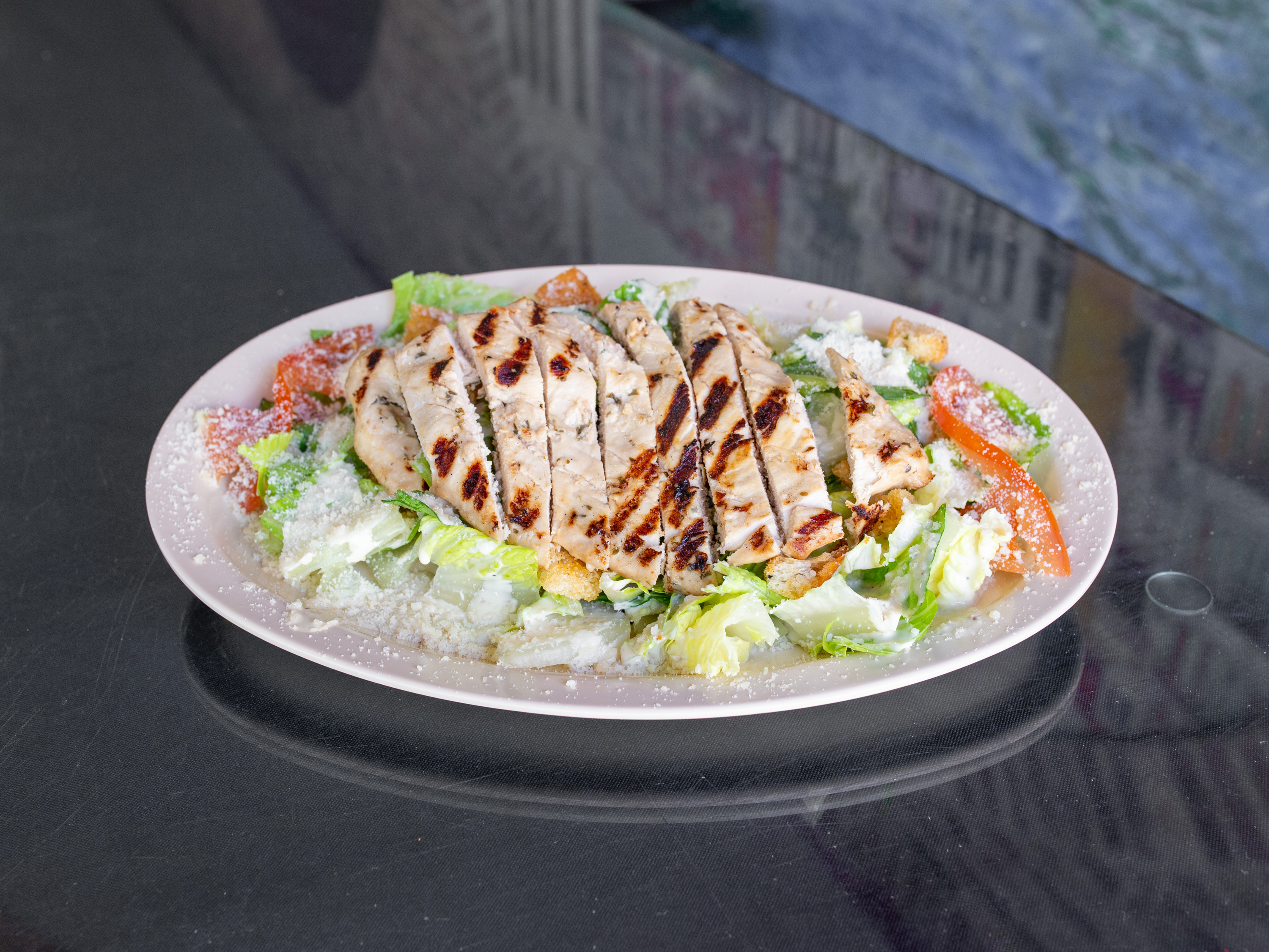 Order Grilled Chicken Caesar Salad food online from Formacio Pizzeria store, Mercedes on bringmethat.com