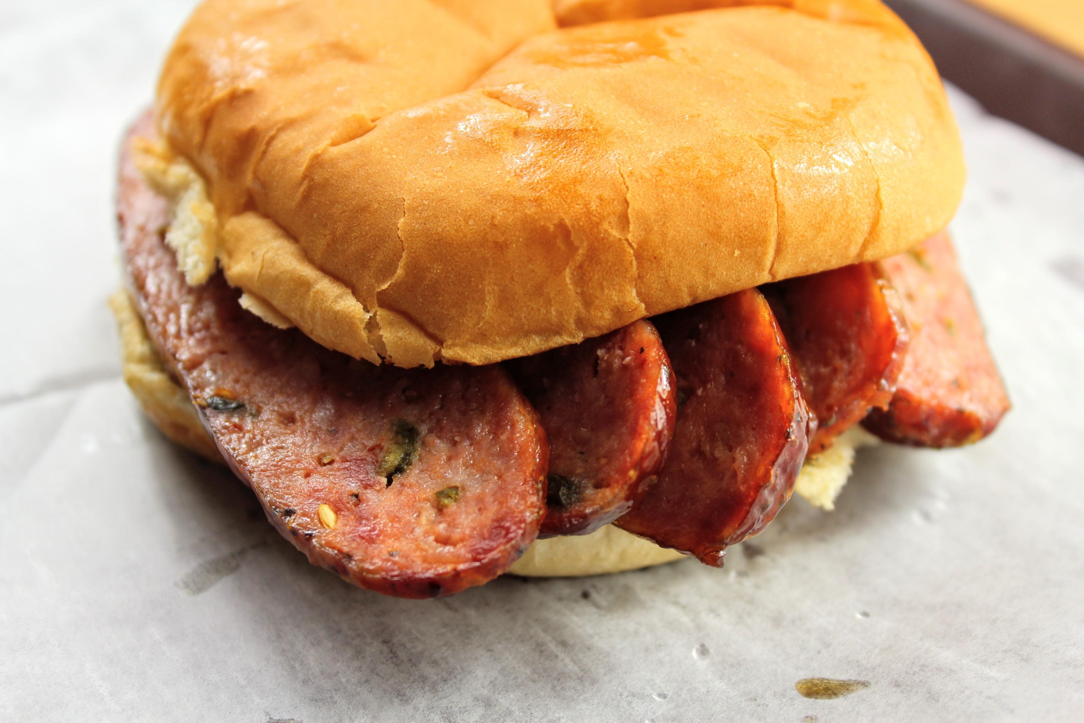 Order Jalpeno Sausage Sandwich food online from Mckenzie's Barbeque store, Conroe on bringmethat.com