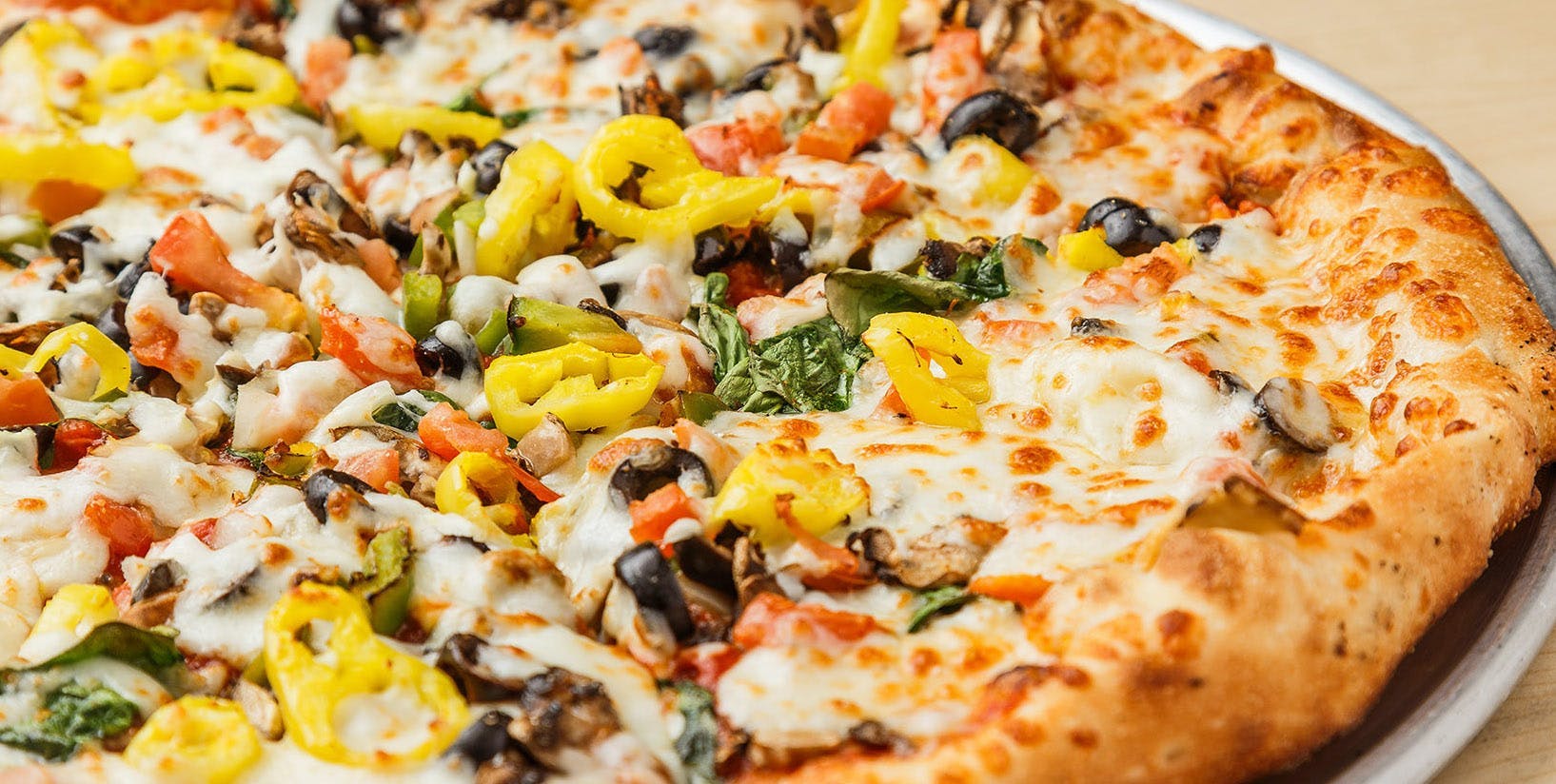 Order Veggie Pizza - Small 10" food online from Zoners Pizza Wings & Waffles store, Statesboro on bringmethat.com