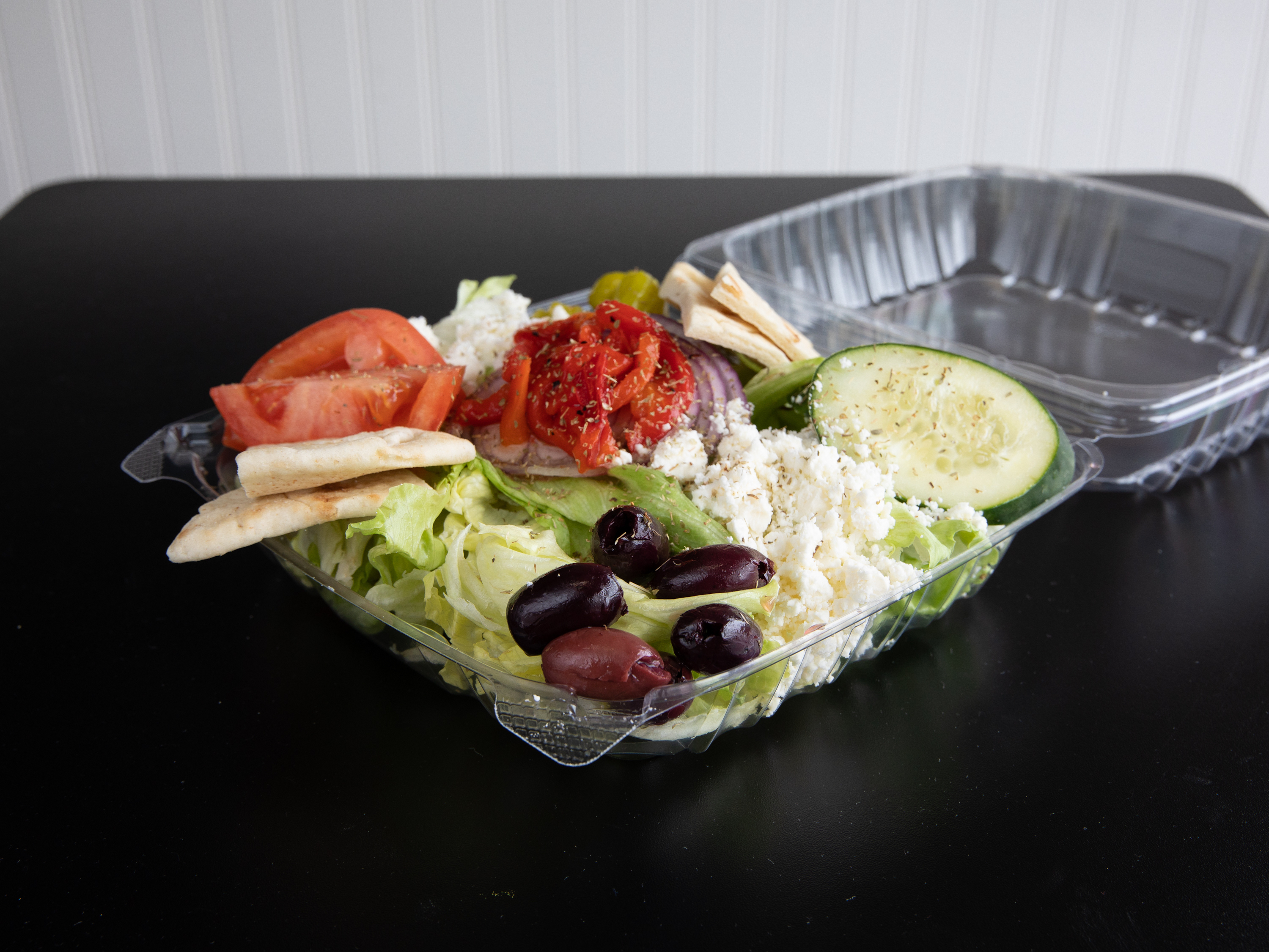Order Fat Greek Salad food online from Uncle Nick's Greek Fried Chicken store, Austintown on bringmethat.com