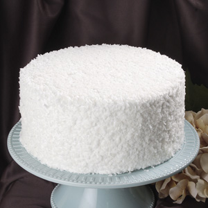 Order White Coconut Dessert Cake food online from Elegant Cakery store, Southlake on bringmethat.com