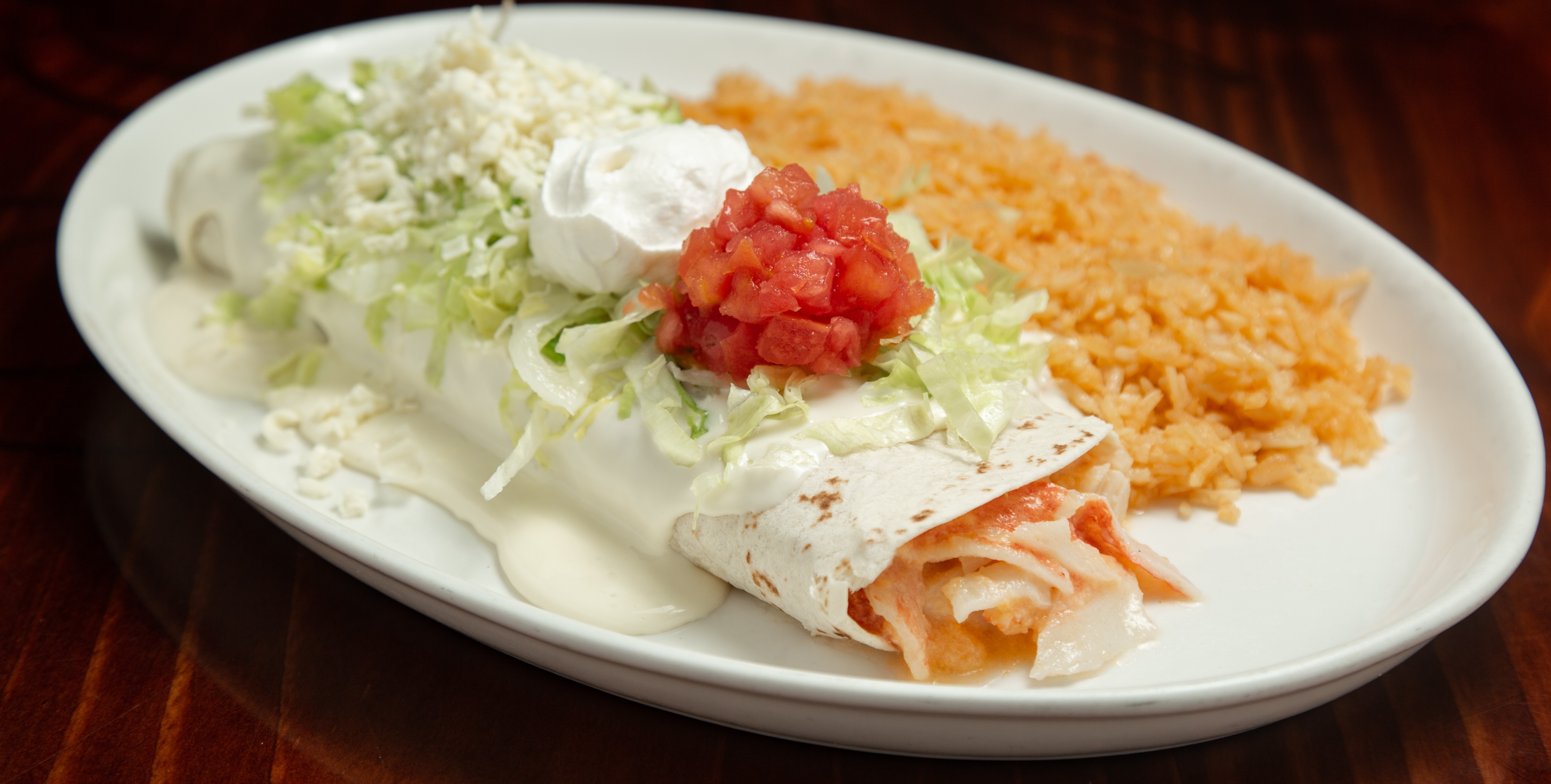 Order Seafood Burrito Dinner food online from Pueblo Real store, Franklin on bringmethat.com