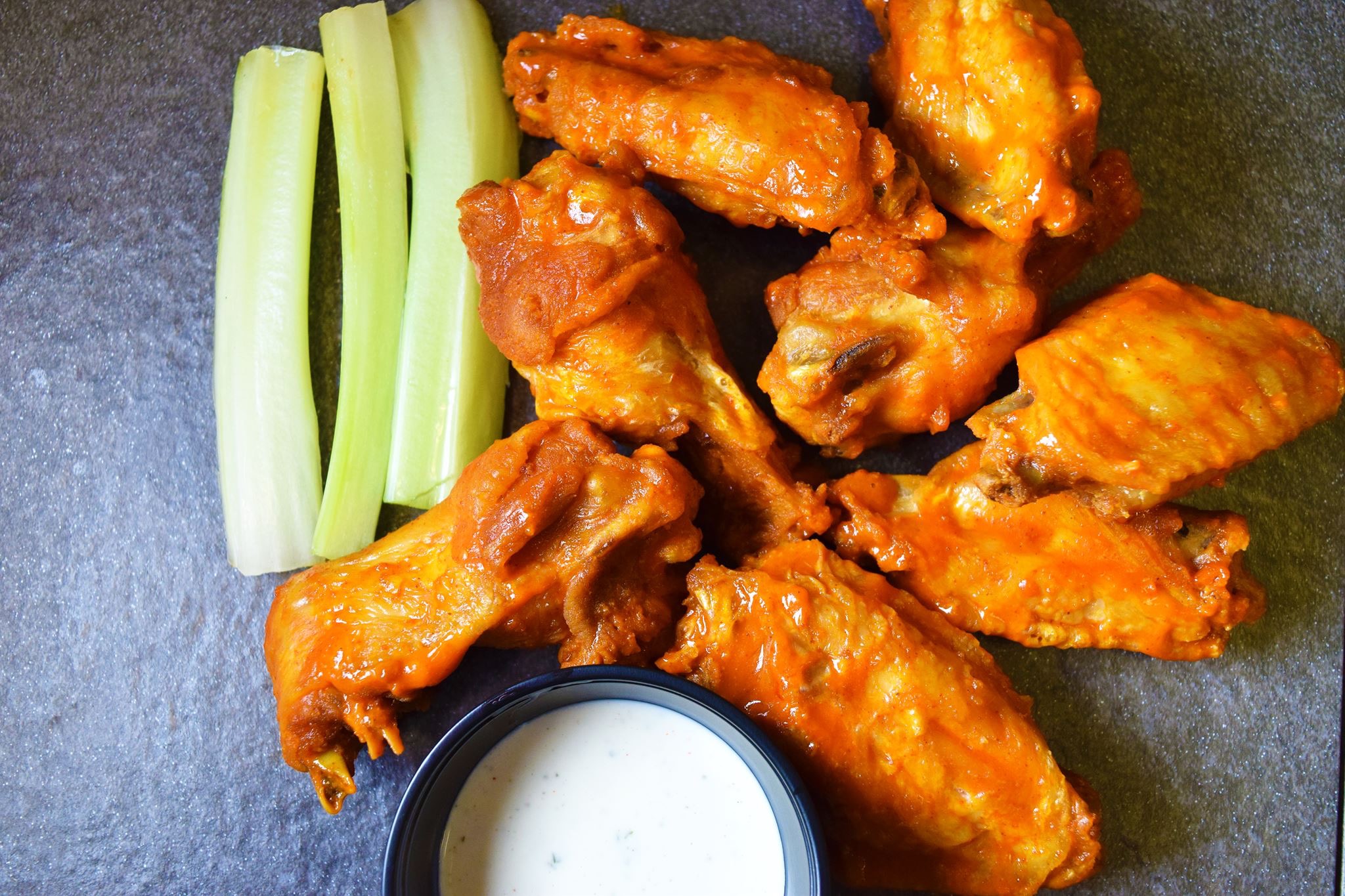 Order 6 Bone-in Wings  food online from Saints Pub + Patio store, Independence on bringmethat.com