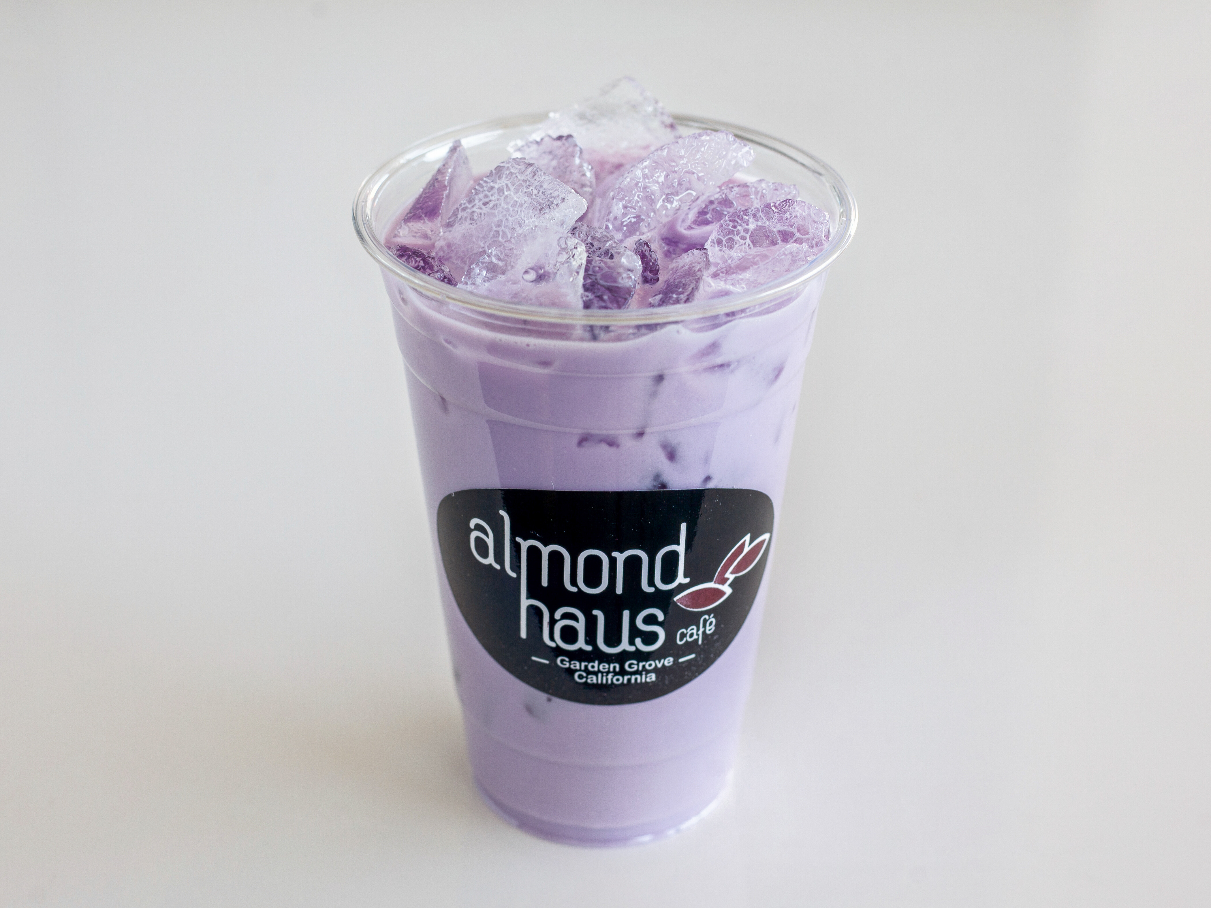 Order Taro Milk Tea food online from Almond Haus Cafe store, Garden Grove on bringmethat.com