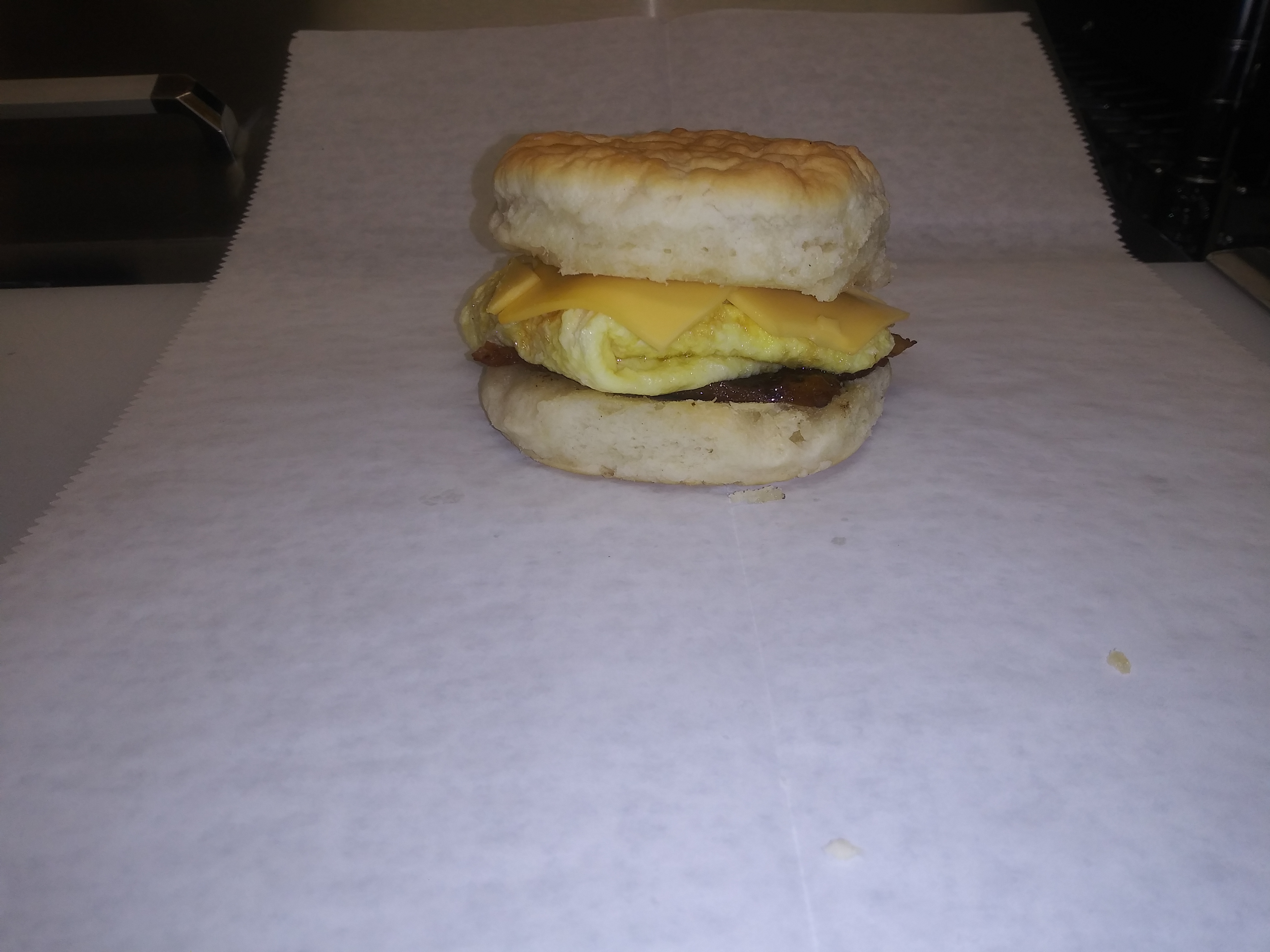 Order Bacon and Egg Biscuit food online from The Sheik store, Starke on bringmethat.com