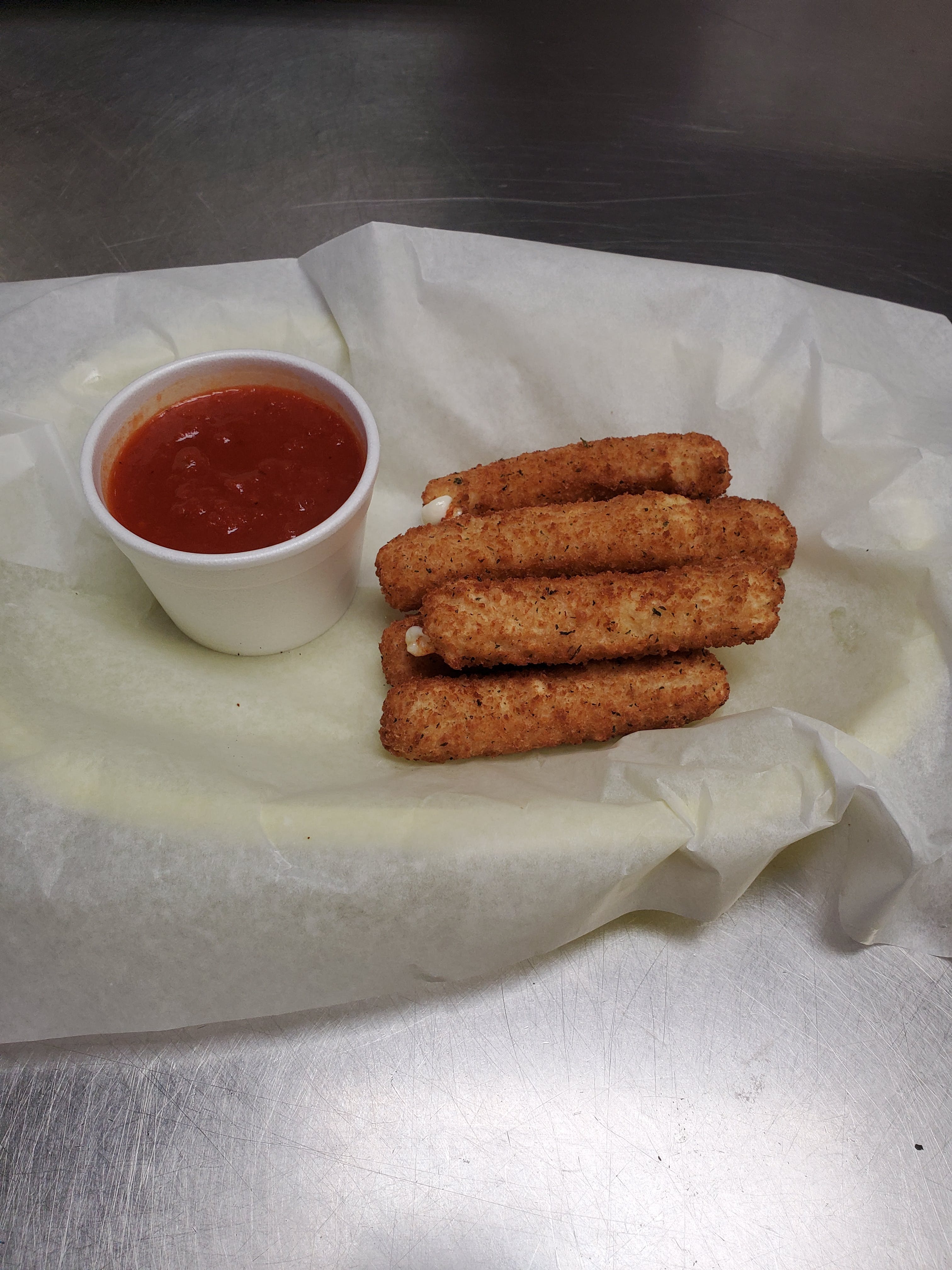 Order Mozzarella Sticks with Marinara Sauce - Appetizer food online from Pizza Cucina store, Oswego on bringmethat.com