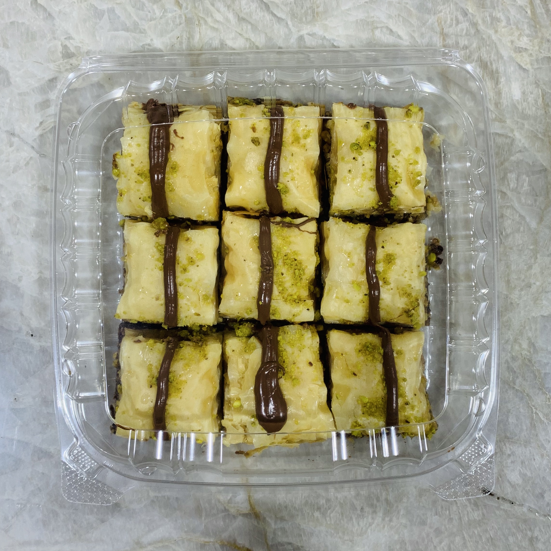 Order 9 Piece Nutella Baklawa Squares food online from Pita Inn store, Naperville on bringmethat.com