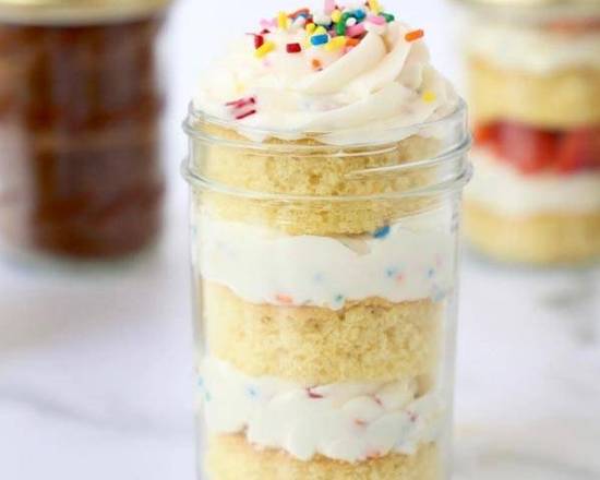 Order NEW Birthday Cake in a Glass Jar with Handmade Buttercream food online from Ny Popcorn store, New York on bringmethat.com