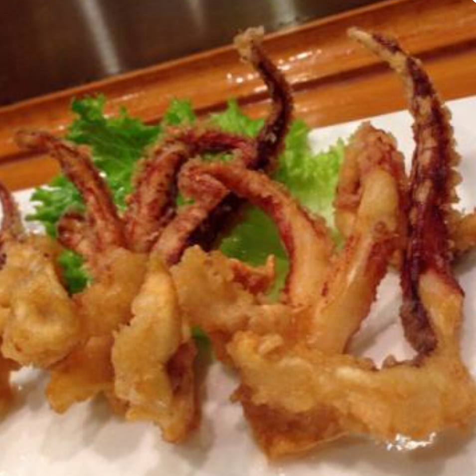 Order Crispy Squid Leg food online from Roll Star Sushi store, Anaheim on bringmethat.com
