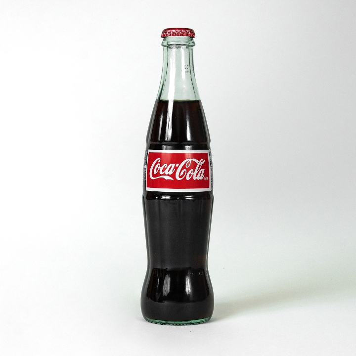 Order Mexican Coke (bottle) food online from Freshly Baked store, San Francisco on bringmethat.com