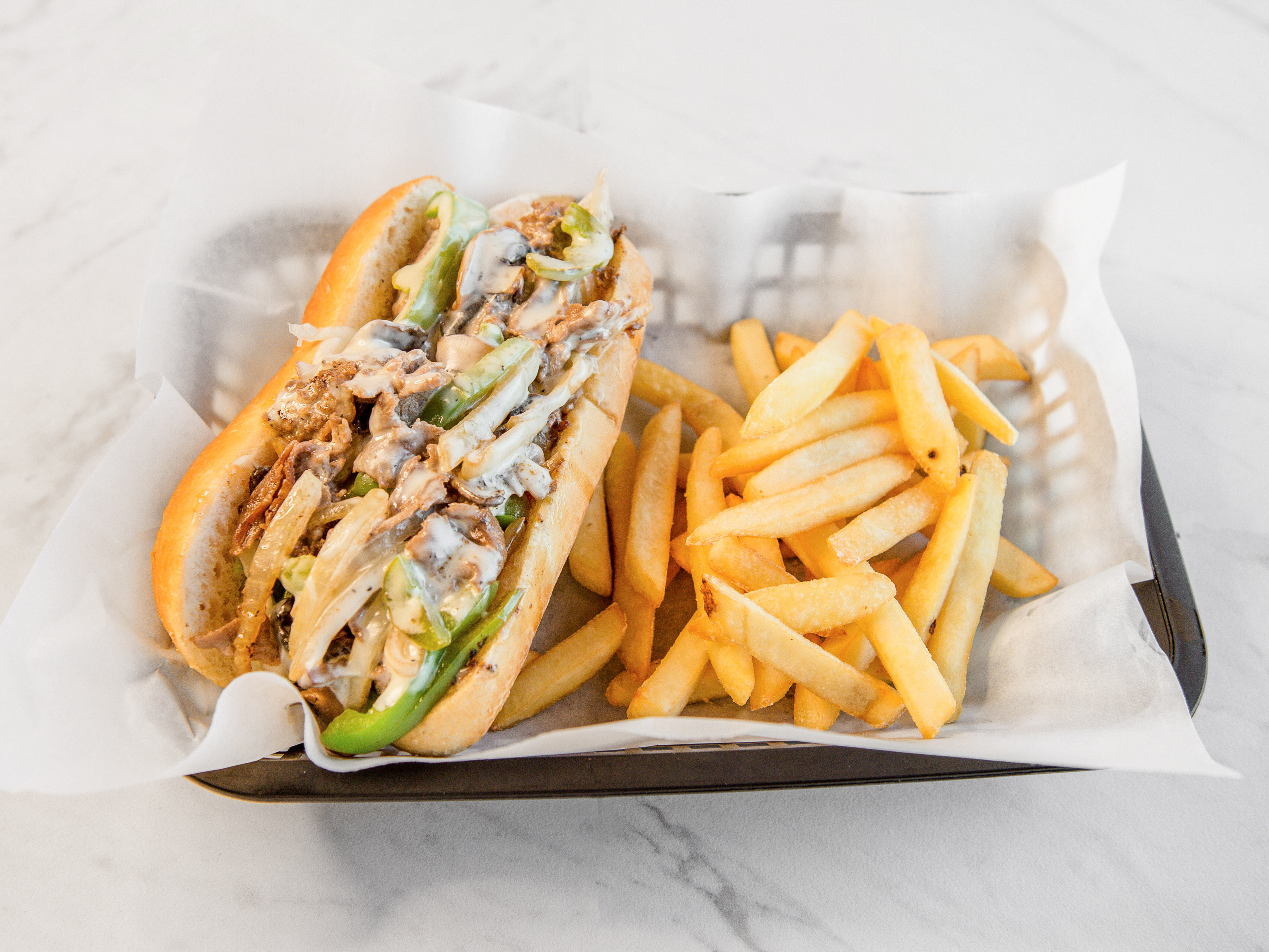 Order Philly Steak and Cheese food online from Cafe Hot Wing store, Marietta on bringmethat.com