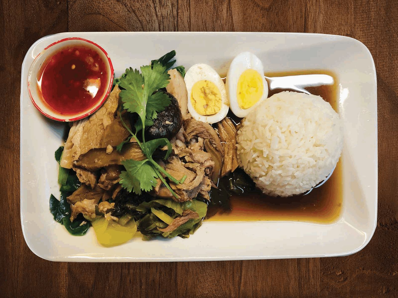 Order 44. Khao Kha Moo food online from Meesen Thai Eatery store, Portland on bringmethat.com